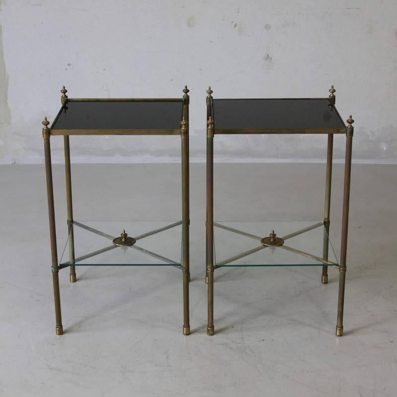 Pair of brass side tables, France, 1960s.

Brass construction with black glass top. 
Condition: 

Excellent vintage condition.
 