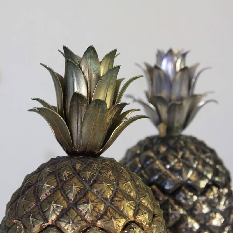 A selection of gilt pineapples, designed by Mauro Manetti, Italy, 1960s.

Stamped 'MM' on the underside.
Golden pineapple without the metal ice buckets - € 550. Silver pineapple € 590.