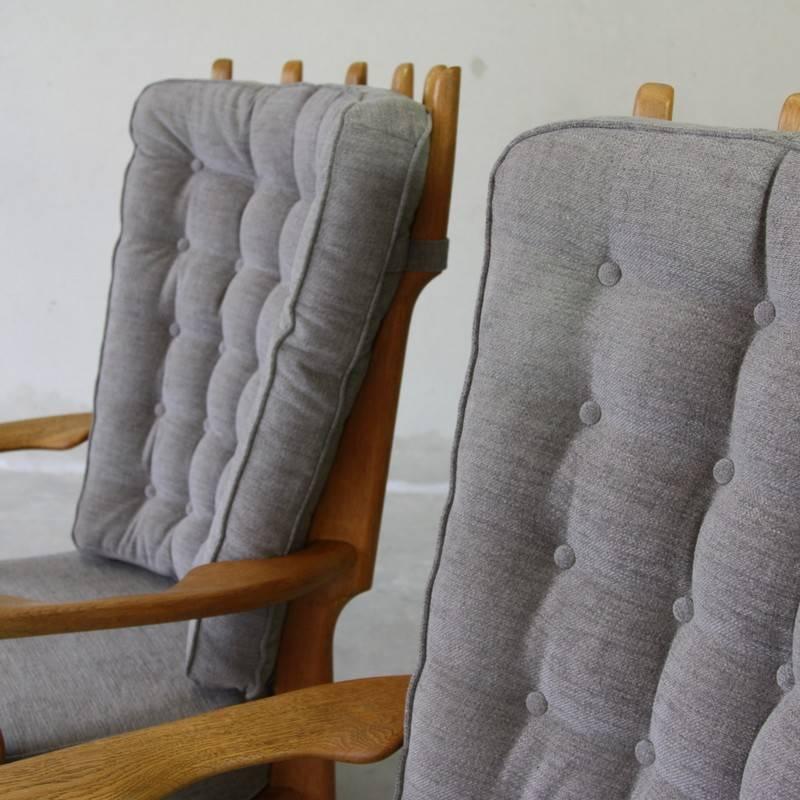 Pair of armchairs, designed by Guillerme et Chambron in the 1950s, France.

Organic wooden construction, newly upholstered in grey wool. Very comfortable, indeed!