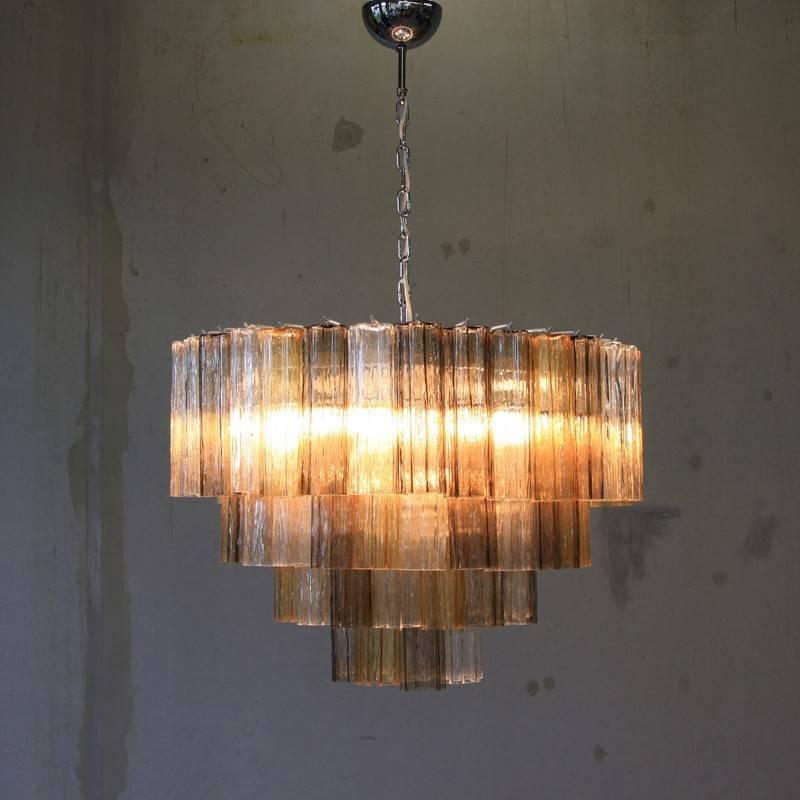 Chandelier with star-shaped tronchi glass pieces, Italy.

Metal structure, chrome-plated with yellow, brown and clear Murano glass pieces. Dimensions of the chandelier only.
