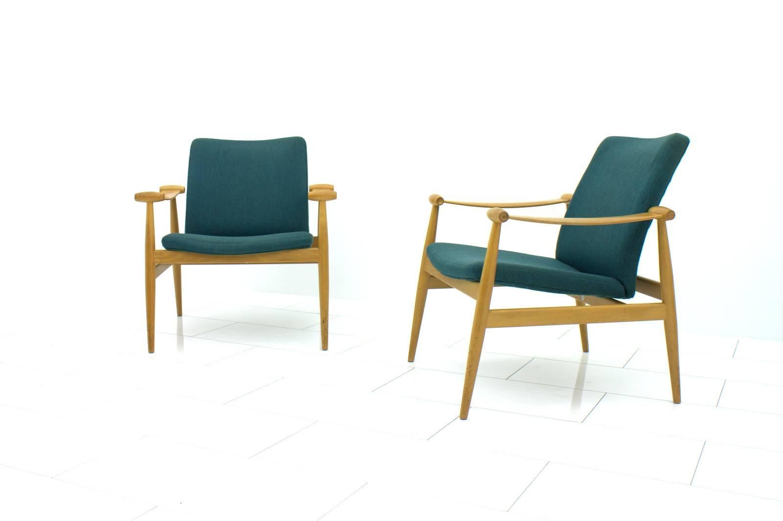 A pair of rare Finn Juhl Spade chairs, FD 133 made in solid beechwood and with covered back and seat parts, no loose cushions.
Marked and stamped with France & Sons, Denmark.

Very good original condition.

Worldwide shipping.
    
