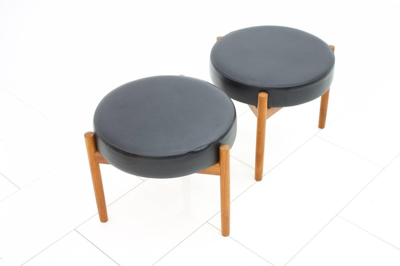 Two teak stools by Spøttrup, Denmark.
Solid Teak wood and black leatherette.
Measures: H 40cm, DM 48 cm.
Very good condition.

Worldwide shipping.