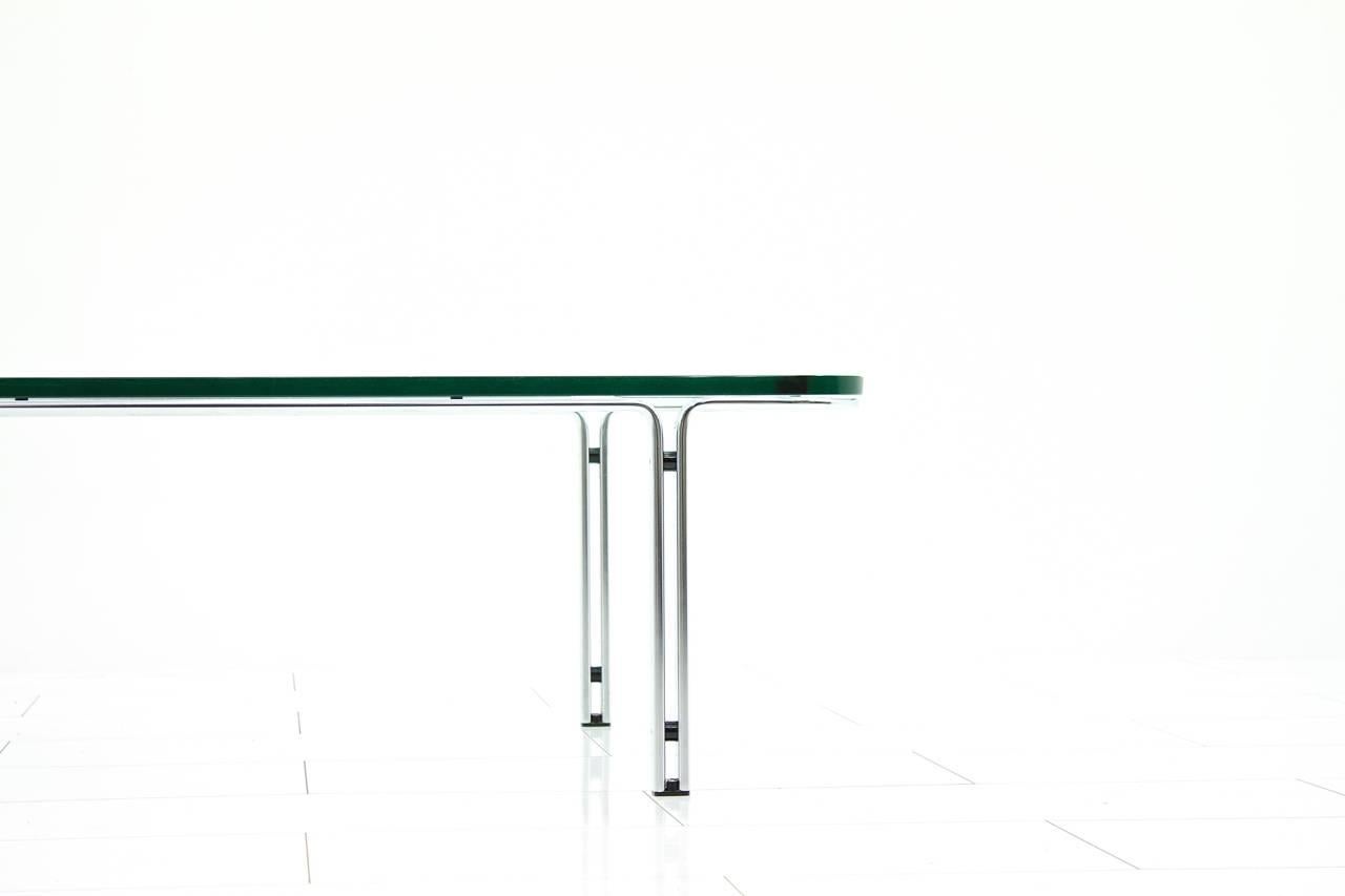 Minimalist steel and glass coffee table by Horst Brüning for Kill International Germany, 1960s.

Good Condition with small scratches in the glass top.

Worldwide shipping

 