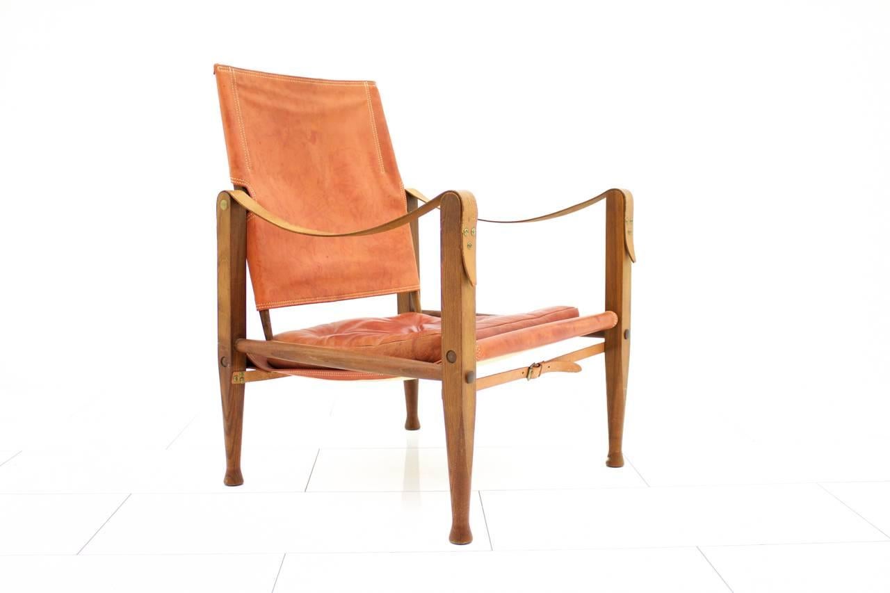 Safari-Stuhl von Kaare Klint by Rud Rasmussen, Dänemark. Hellrotes Leder.
Sehr guter Zustand.
 