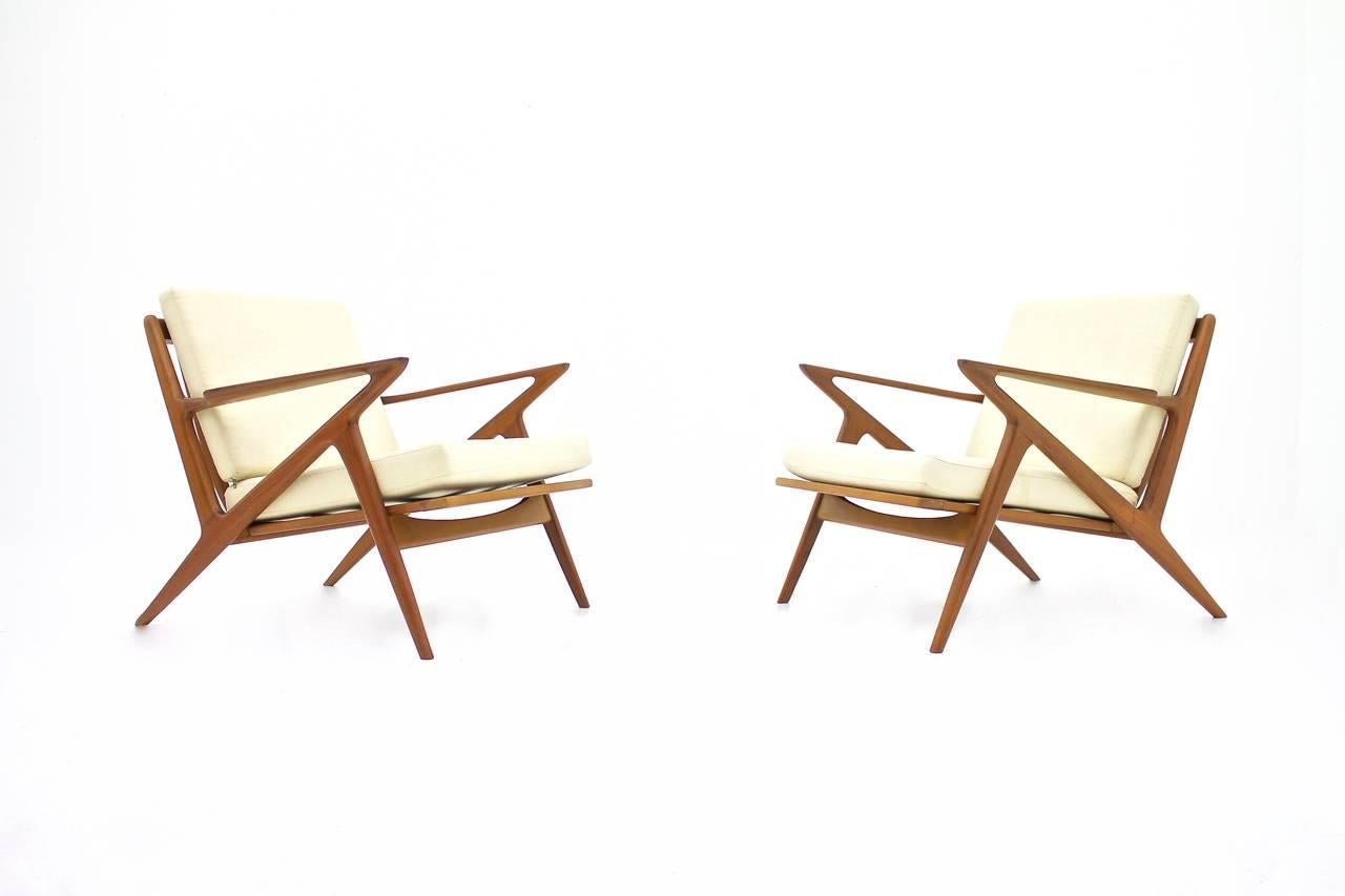 Beautiful and rare pair of teakwood lounge chairs "Z" chairs by Poul Jensen for Selig, Denmark, 1960s.
W 76 cm, D 84 cm, H 71 cm, SH 39 cm. 

Very good Condition.