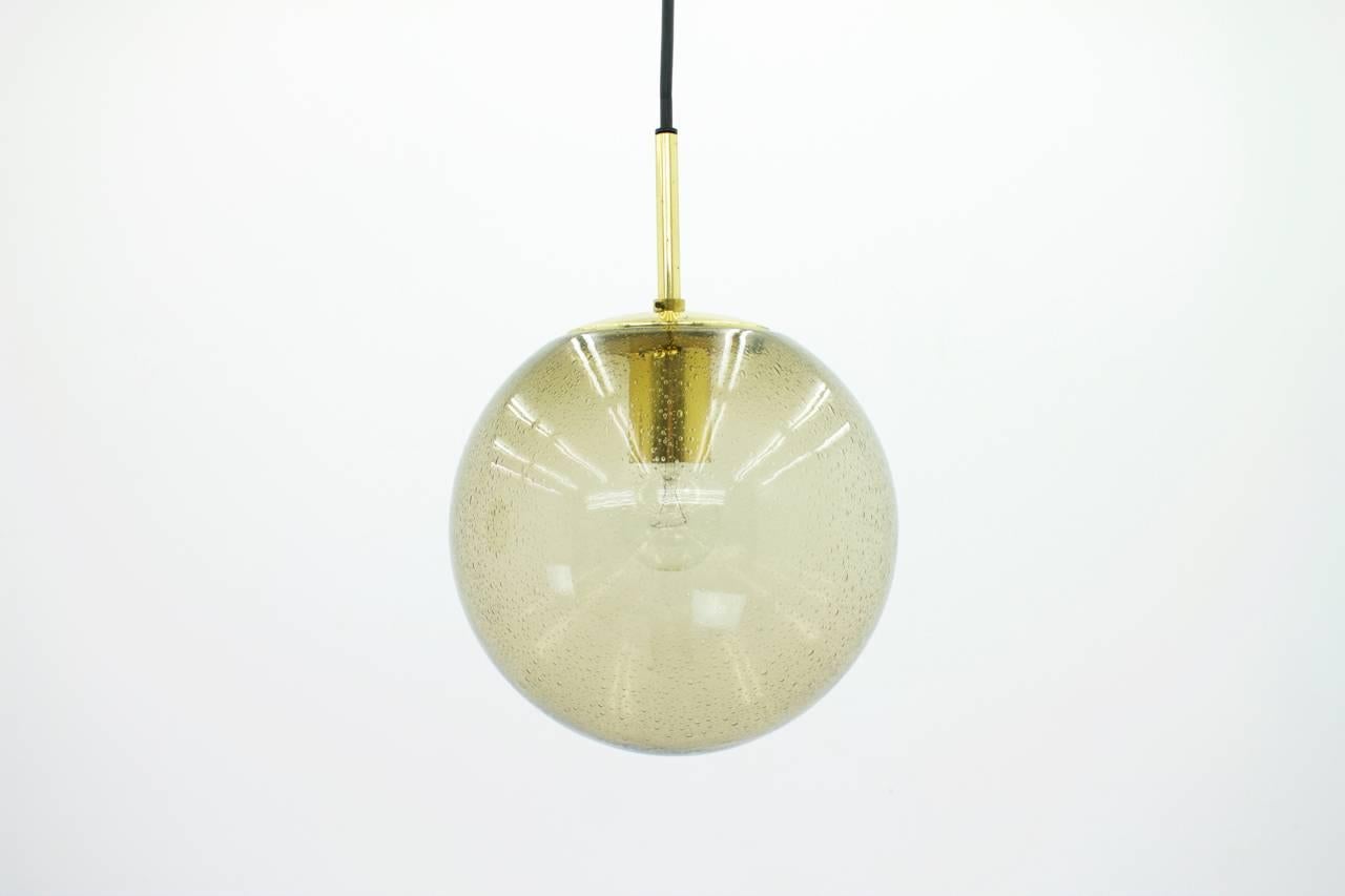 Pair of smoked glass and brass glass ball pendants by Glashütte Limburg,
Germany, 1970s.

Very good condition.

Worldwide shipping.
 