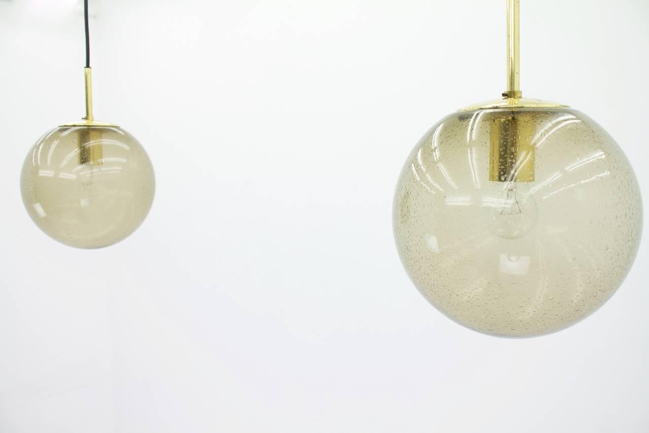 Mid-Century Modern Limburg Pair of Smoked Glass and Brass Glass Ball Pendants 1960s