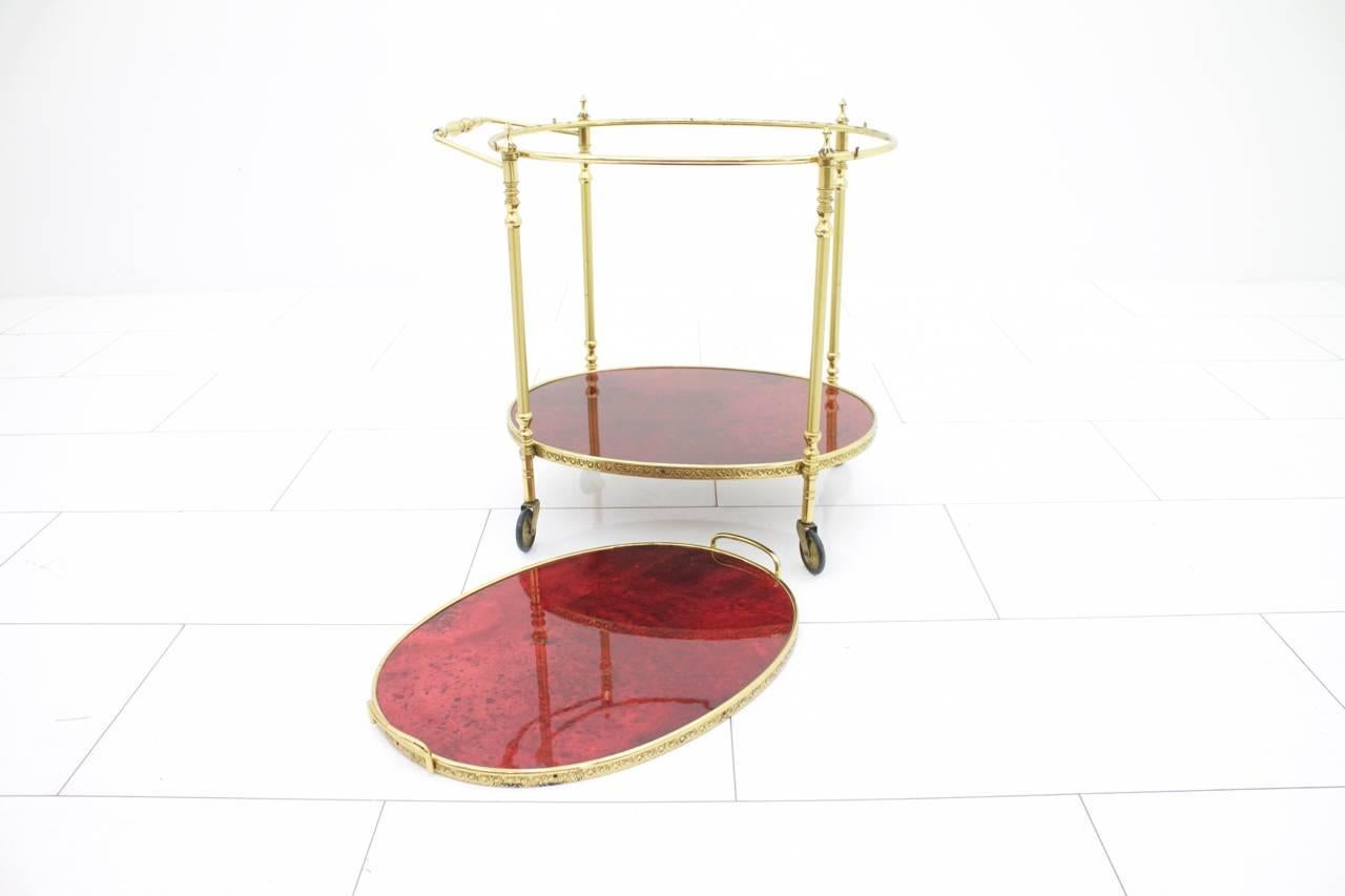 Bar Cart by Aldo Tura in red goatskin and brass, Italy 1960s.

Very good condition.

Worldwide shipping.