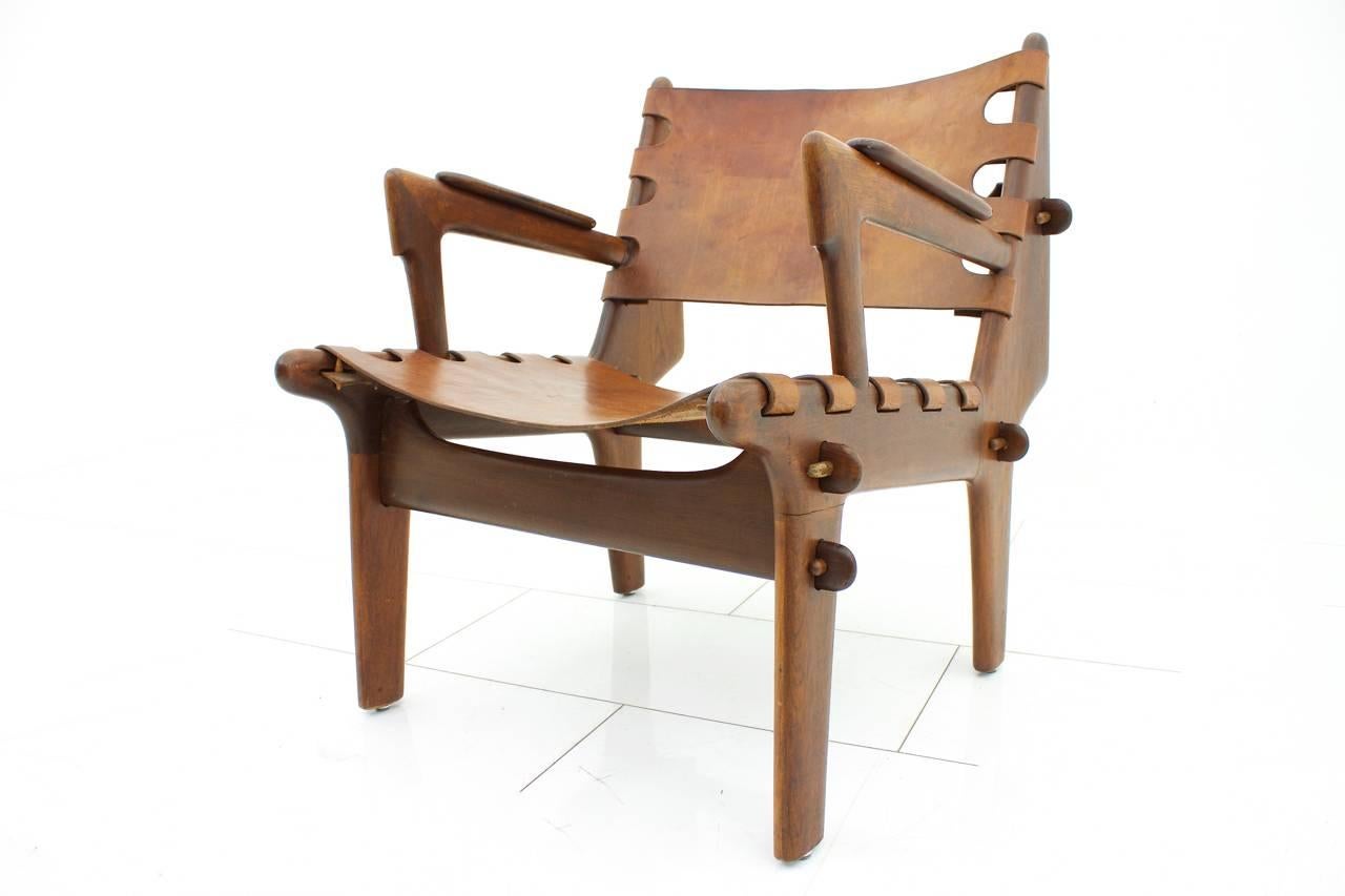 Angel Pazmino lounge chair, Peru, 1960s.
Wood and leather. 

Very good condition with fantastic patina.

Worldwide shipping.