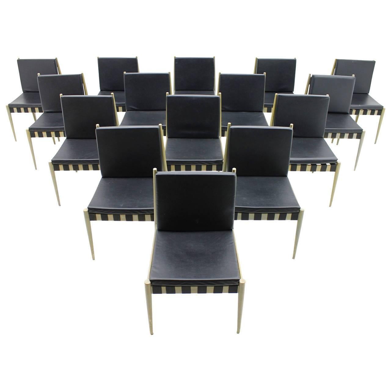 A large set of 60 dining room chairs SE 121 by architect Egon Eiermann, 1964. This chairs are in a rare grey color and black Leatherette cushions. The chairs are from 1965. 

Good original condition.

Worldwide shipping.