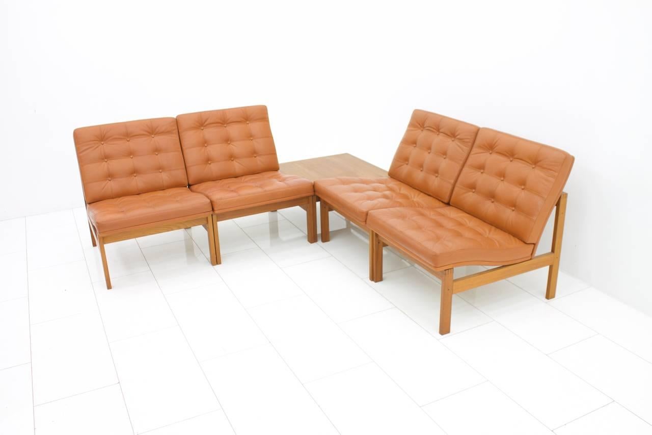 
Set of four chairs and one table by France & Son. Teakwood and leather by Torben Lind and Ole Gjerlov for France & Sons Denmark, 1962. Good original condition. 

Worldwide shipping.