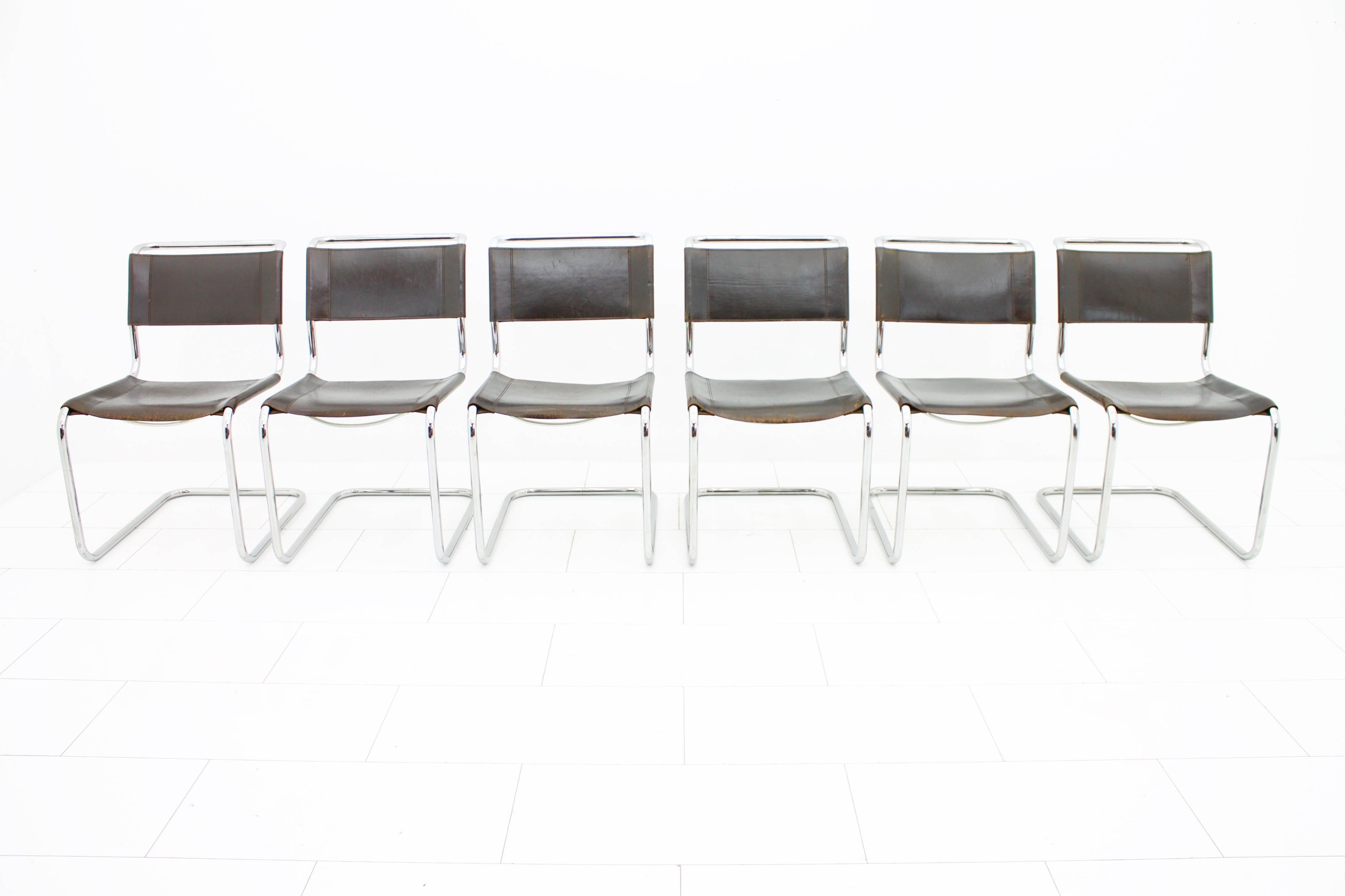 Set of six S33 steel tube chairs with dark brown leather by Mart Stam produced by Thonet. Every chair is marked with Thonet.
Measures: H 85 cm, W 50 cm, D 65 cm.
Very good condition with nice patina.
Worldwide shipping.