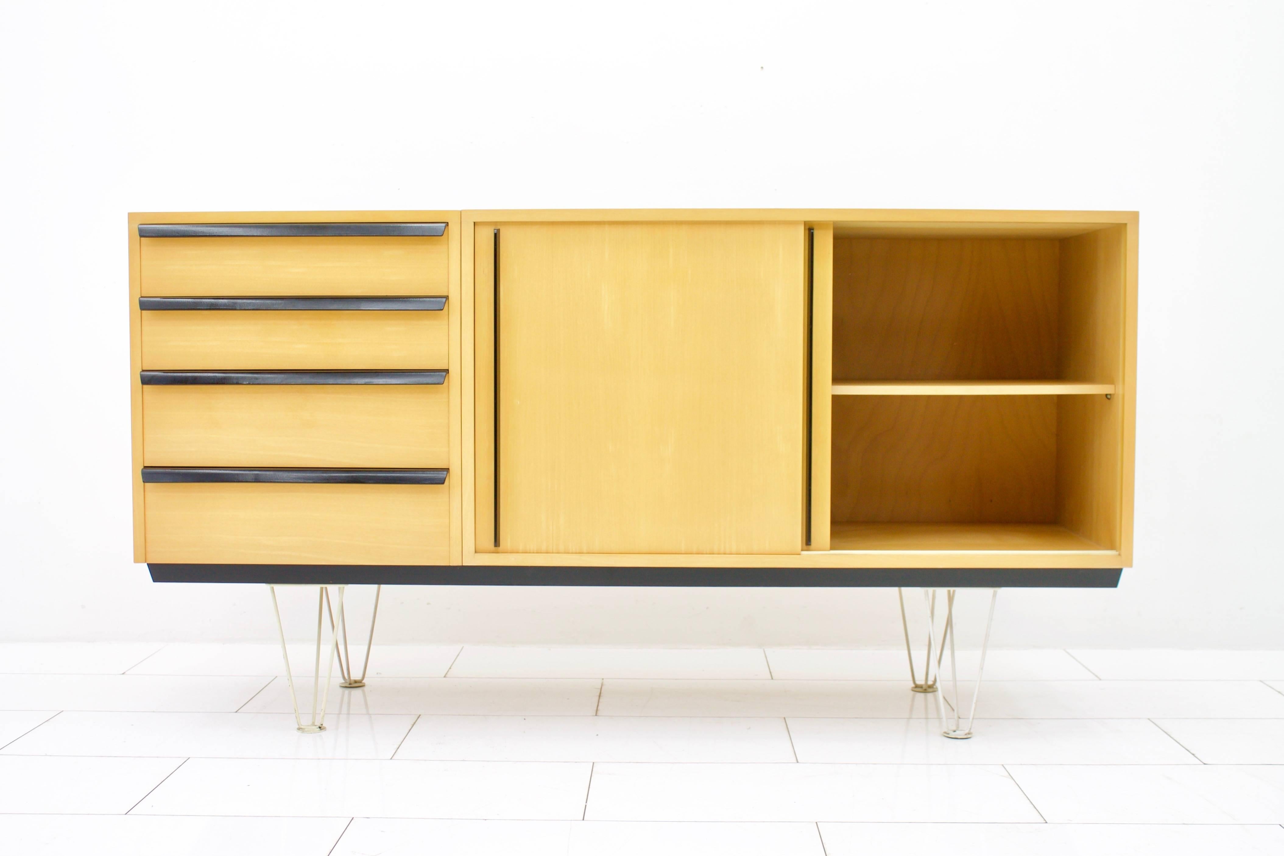 Rare sideboard by Alfred Altherr for Freba, Switzerland, 1955. Cherrywood and black lacquered wood grips and white metal legs.
Measures: W 165 cm, H 87.5 cm, T 48 cm.

Very good condition.

Worldwide shipping.