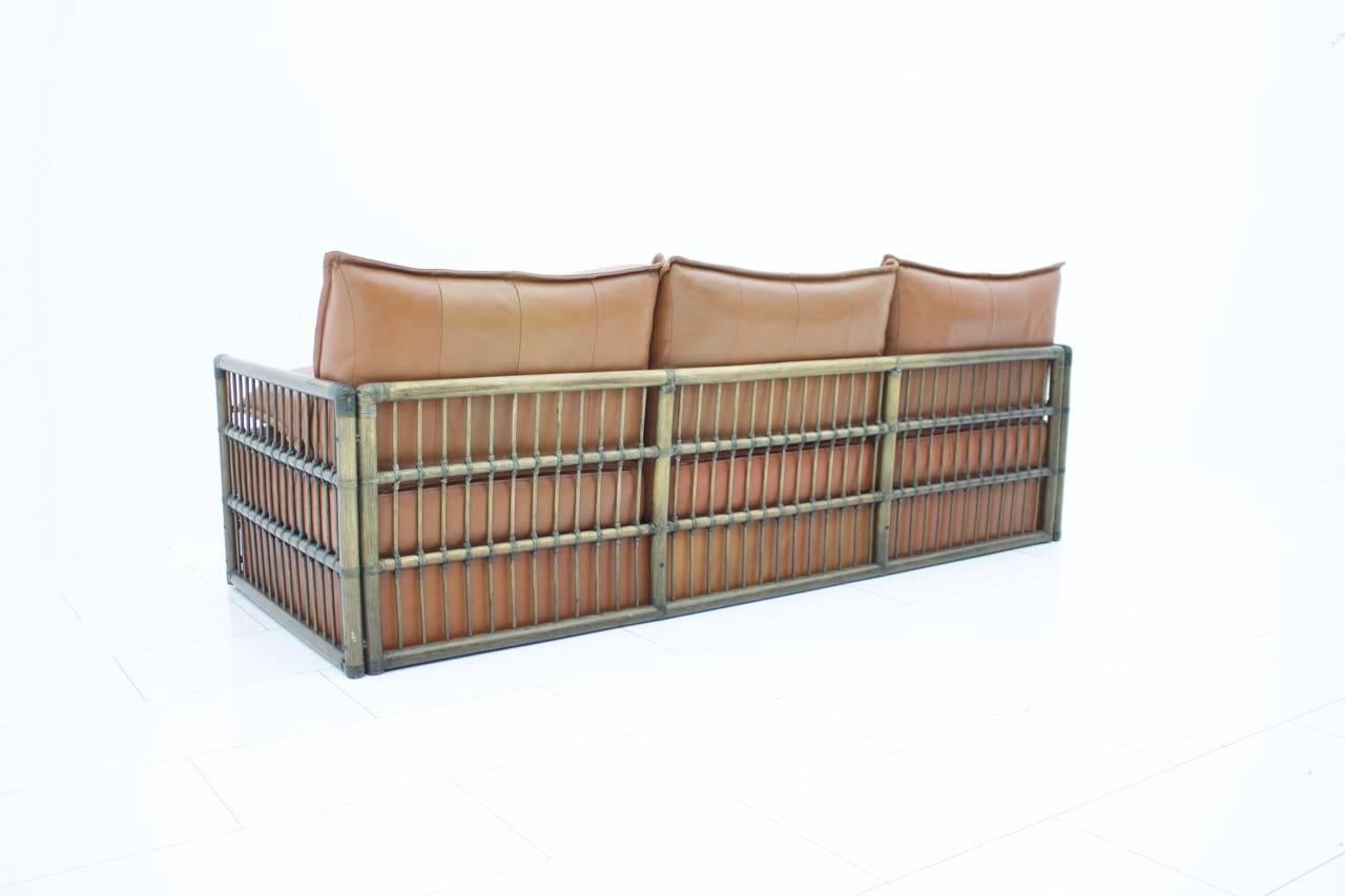 Late 20th Century Three Person Leather Sofa with Rattan 1978 For Sale