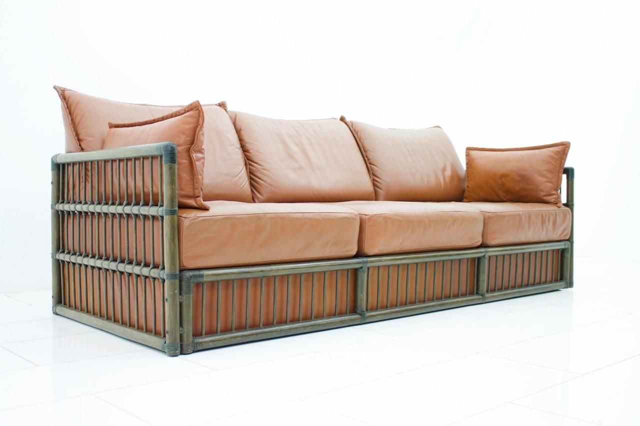 Hollywood Regency Three Person Leather Sofa with Rattan 1978 For Sale