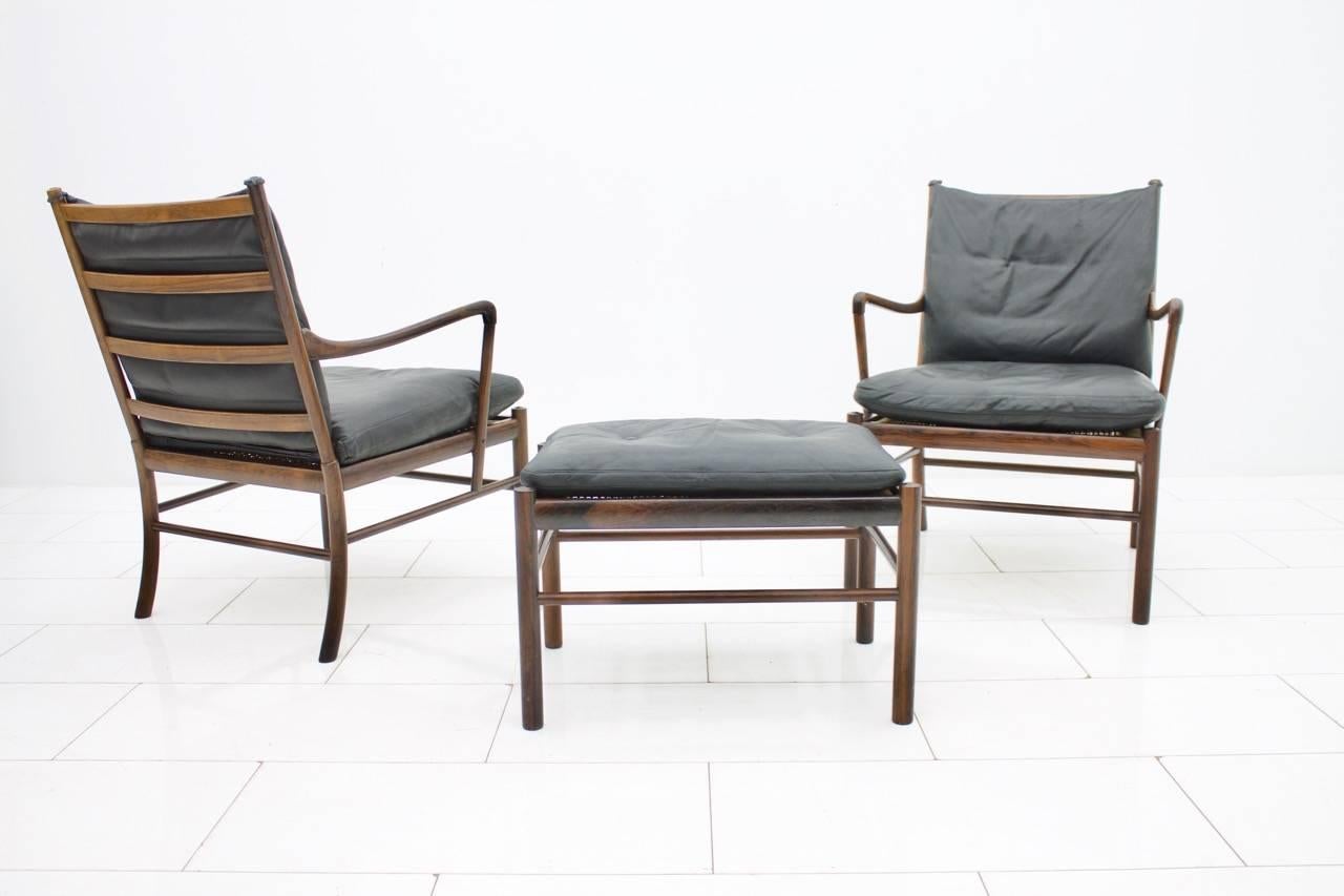 Pair of Colonial chairs and a stool by Ole Wanscher and made by Paul Jeppesen. Solid wood and down-filled cushion with back leather.
Produced in 1960s.
Very good original condition.

 