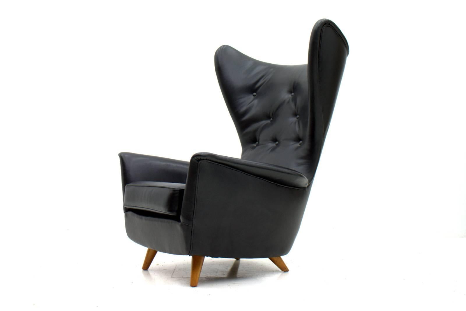 Mid-20th Century Four Black Leather Wing Lounge Chairs, 1950s For Sale