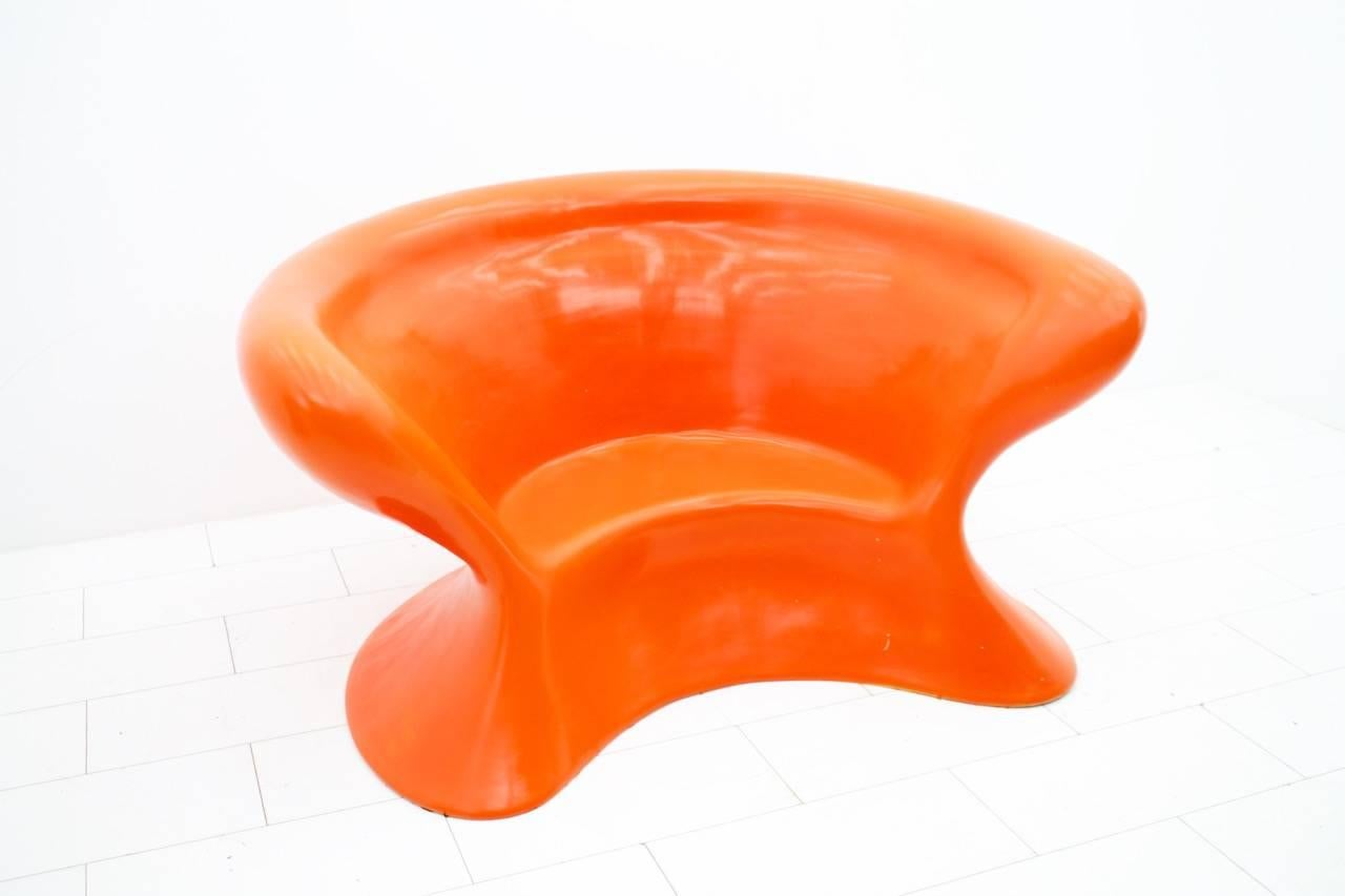 Large object chair made of polyurethane and fiberglass from circa the 1970s. Made for indoor or outdoor area. 
Great organic shape and a real eye-catcher.


 