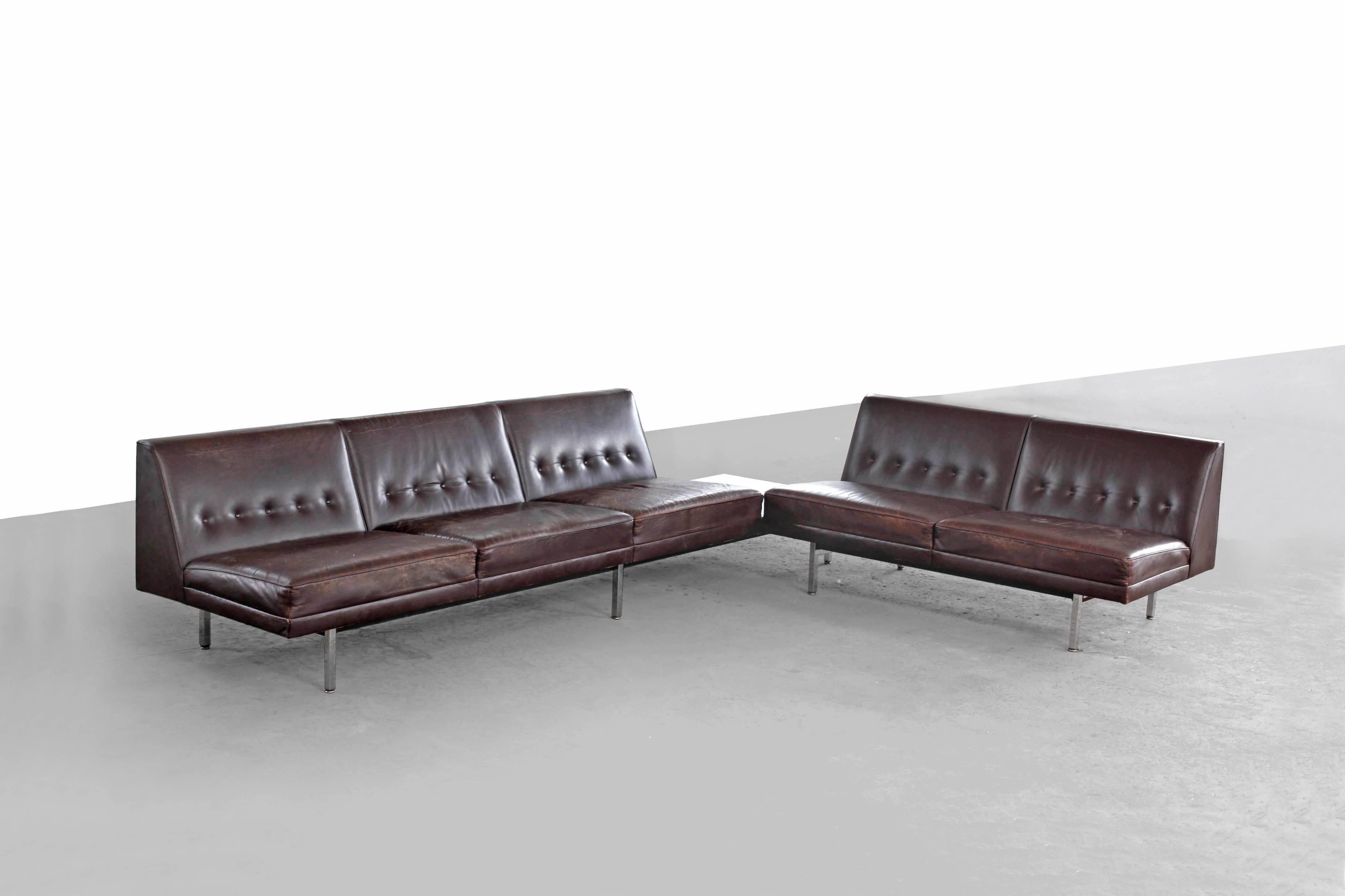 Modular seating system by George Nelson for Herman Miller produced from 1956-1978.
This six-part system can be positioned variably. An absolute design Classic in the original condition. The dark brown leather is heavily patinated by the years. A