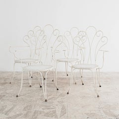 Lio Carminati, actor. Conjunto de 4 sillones de jardín de hierro blanco con diseño en abanico de los años 50