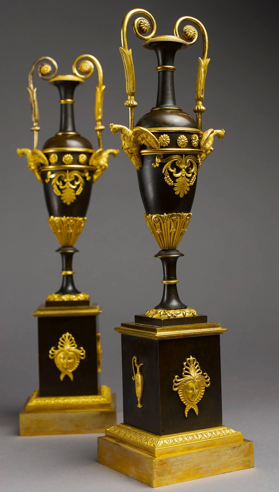 A very fine pair of gilt and patinated Empire period bronze vases, France, circa 1820. Because of their quality, theses vases come very likely from the workshop of one of the most renowned Parisian bronziers of the time, like Claude Galle or