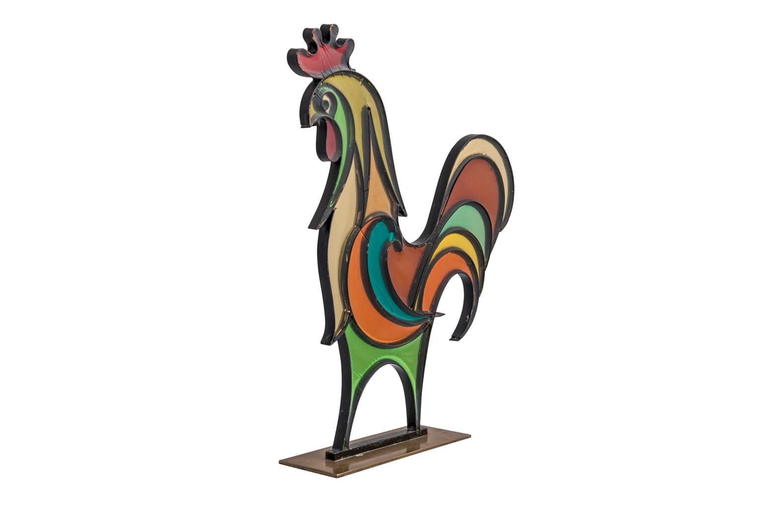 Rooster by Franz Hagenauer,  Austrian Mid-Century Art Deco, Brass, Resin, 1940s-1950s, Werkstätte Hagenauer Wien 

Franz Hagenauer liked to experiment with different materials. He took an enamel class at the Wiener-Kunstgewerbeschule (Viennese