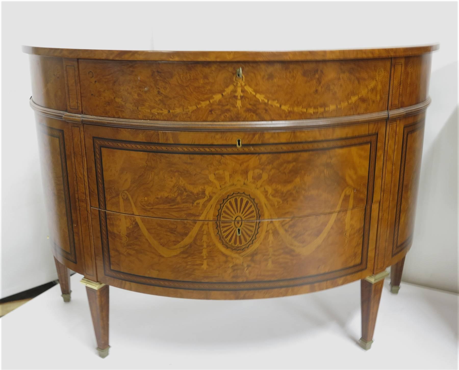 Pair of Francesco Molon demilune commodes with inlaid wood designs.