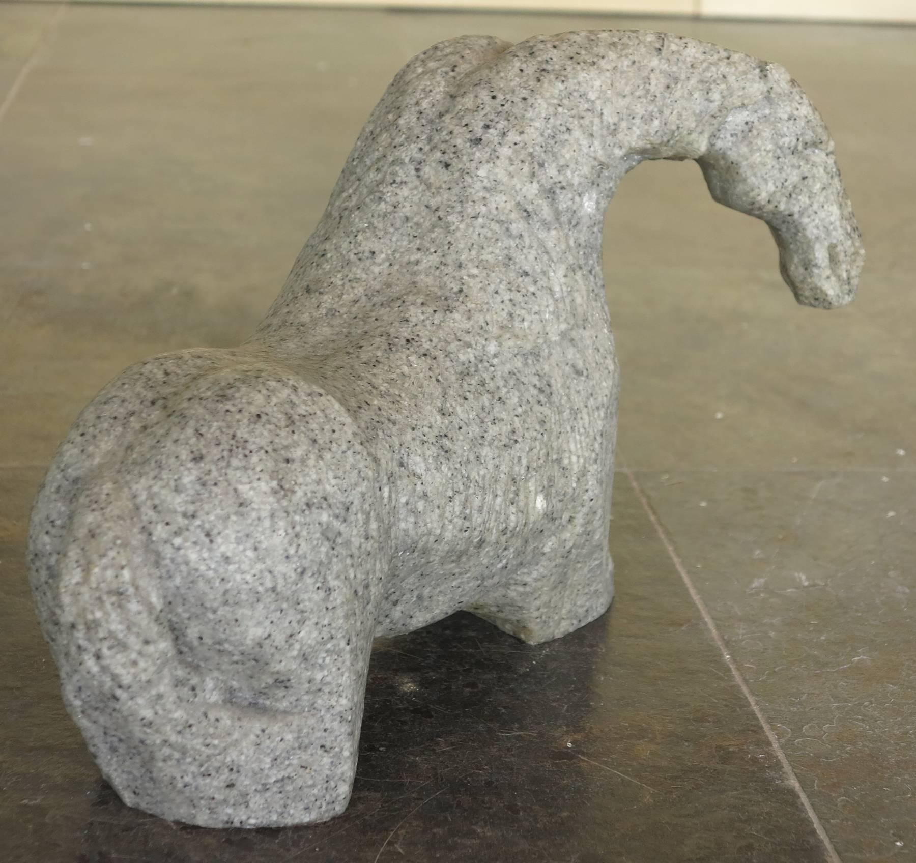 Chipped craved granite horse sculpture. From the 1980s unsigned in very good condition.