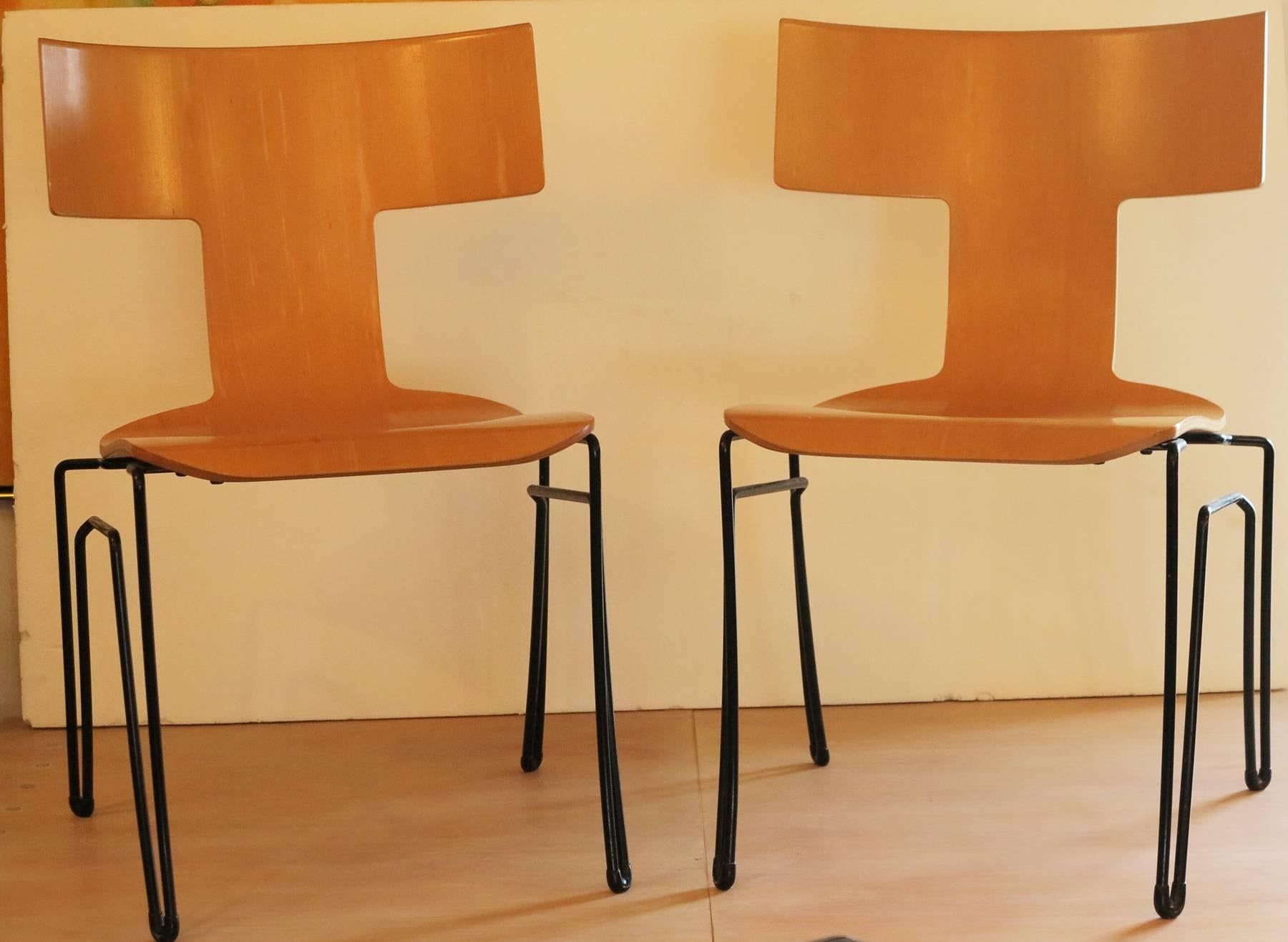 Anziano chairs by John Hutton for Donghia. The chairs retain their original finish and are in excellent condition.