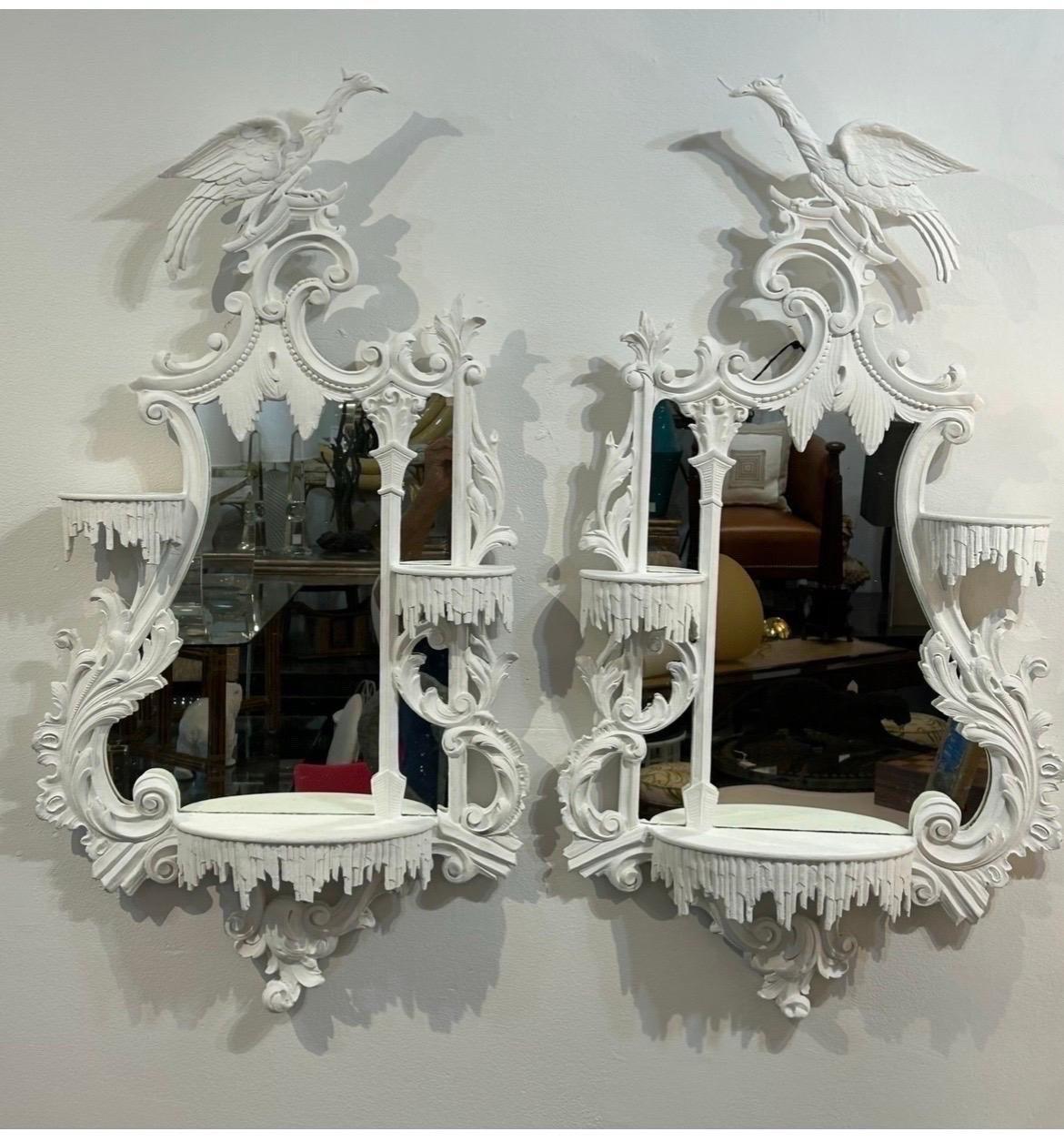 A pair of Mid Century Hoho bird mirrors.. in a white gesso  finish. Very sturdy construction detail is sublime… The mirrors are opposing in very good vintage condition.