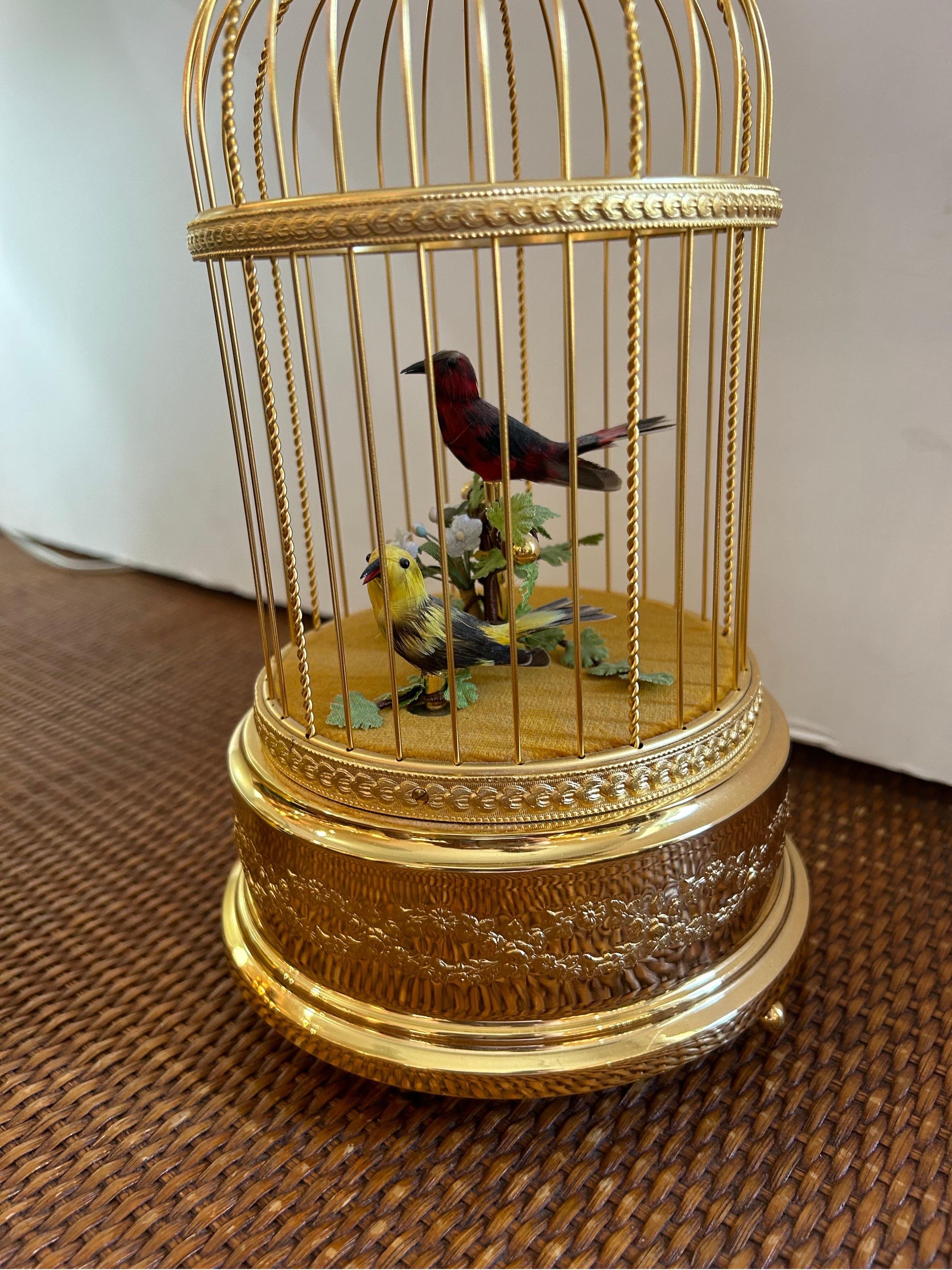 Reuge Swiss music box domed birdcage with two singing and moving birds in very clean, unused condition… manufactured by Reuge Music St. Croix, Switzerland, signed . everything works smoothly. Please see photos and look and listen to the video.