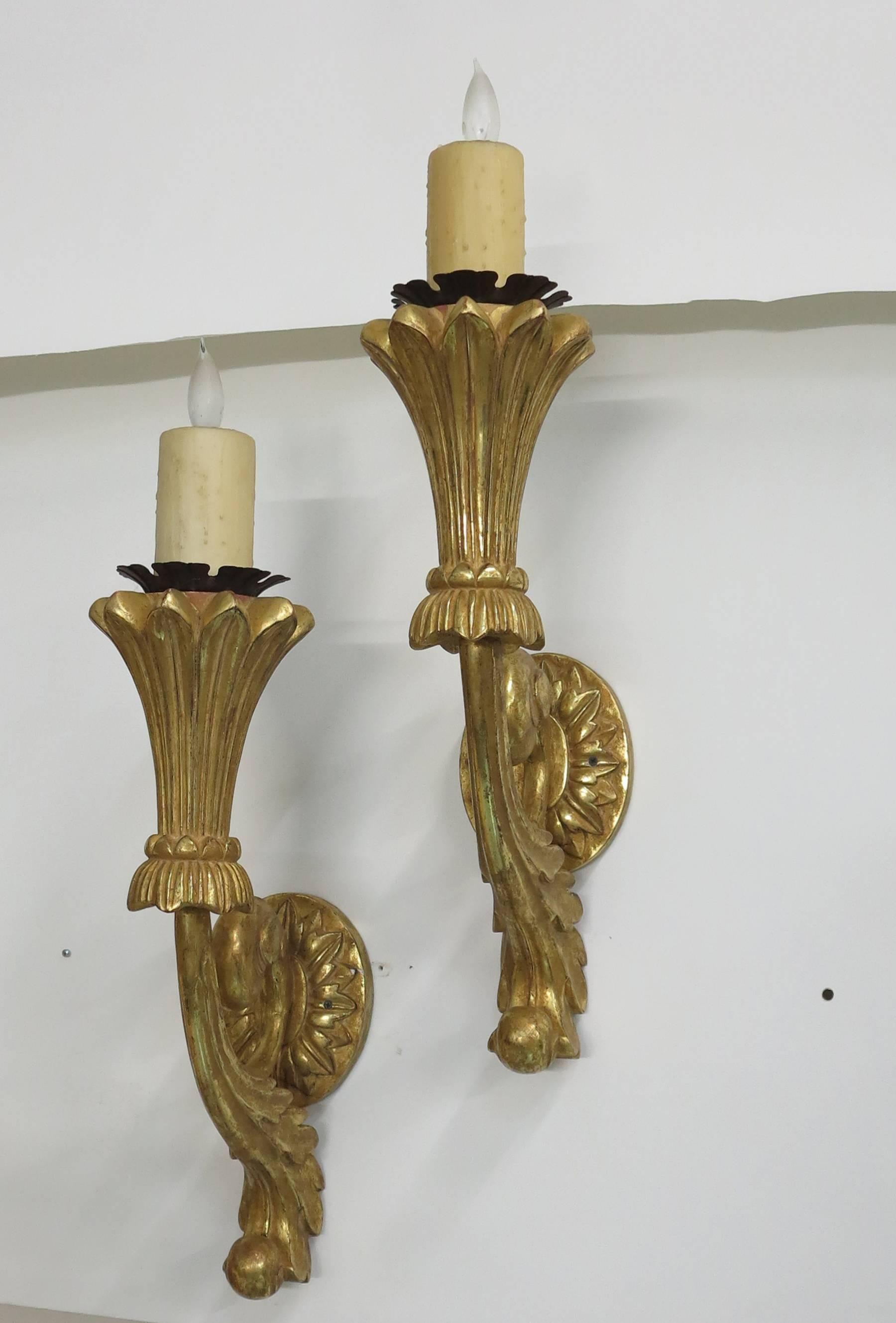 Italian Carved Gilt wood wall sconces. Pair large scale wood sconces with a bright gilt finish