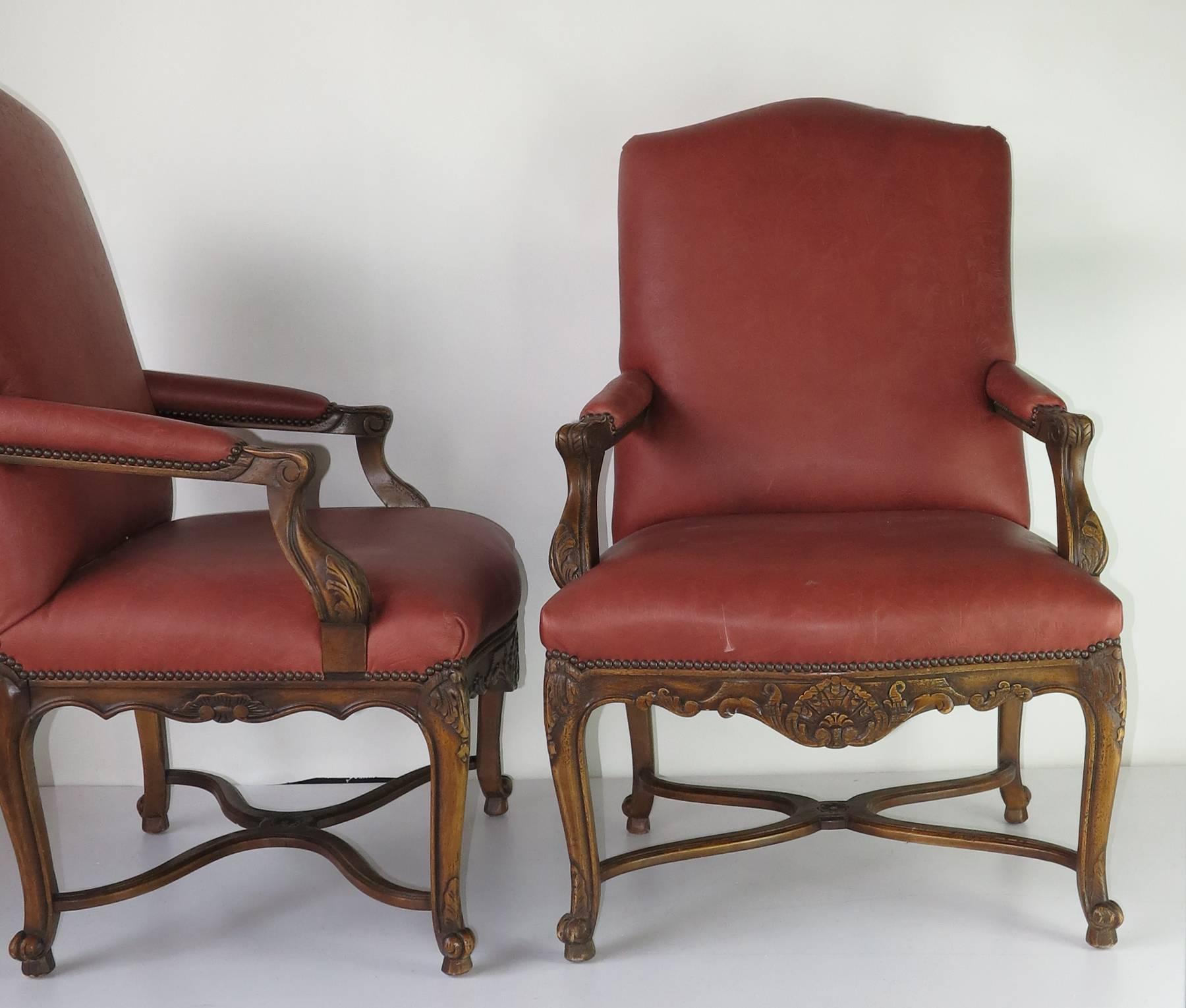Red embossed  arm chairs Chairs. Louis xiv style chairs with carved aprons.