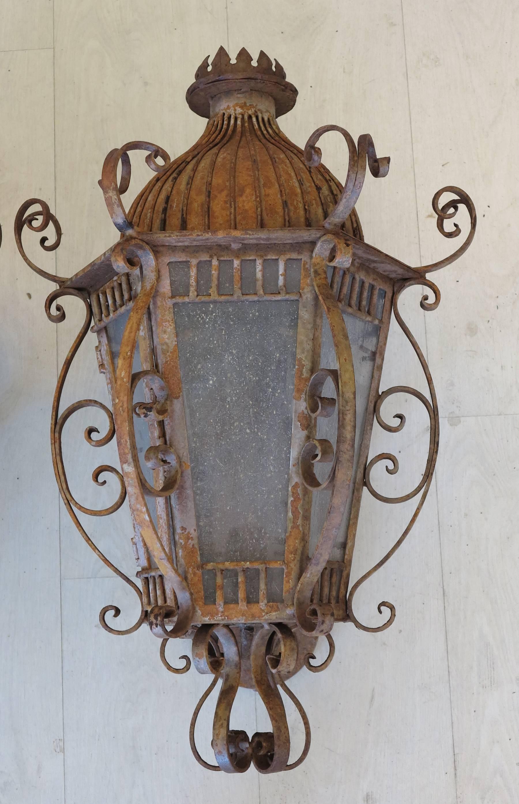 Spanish revival hand-forged iron wall lights. Have the original 
