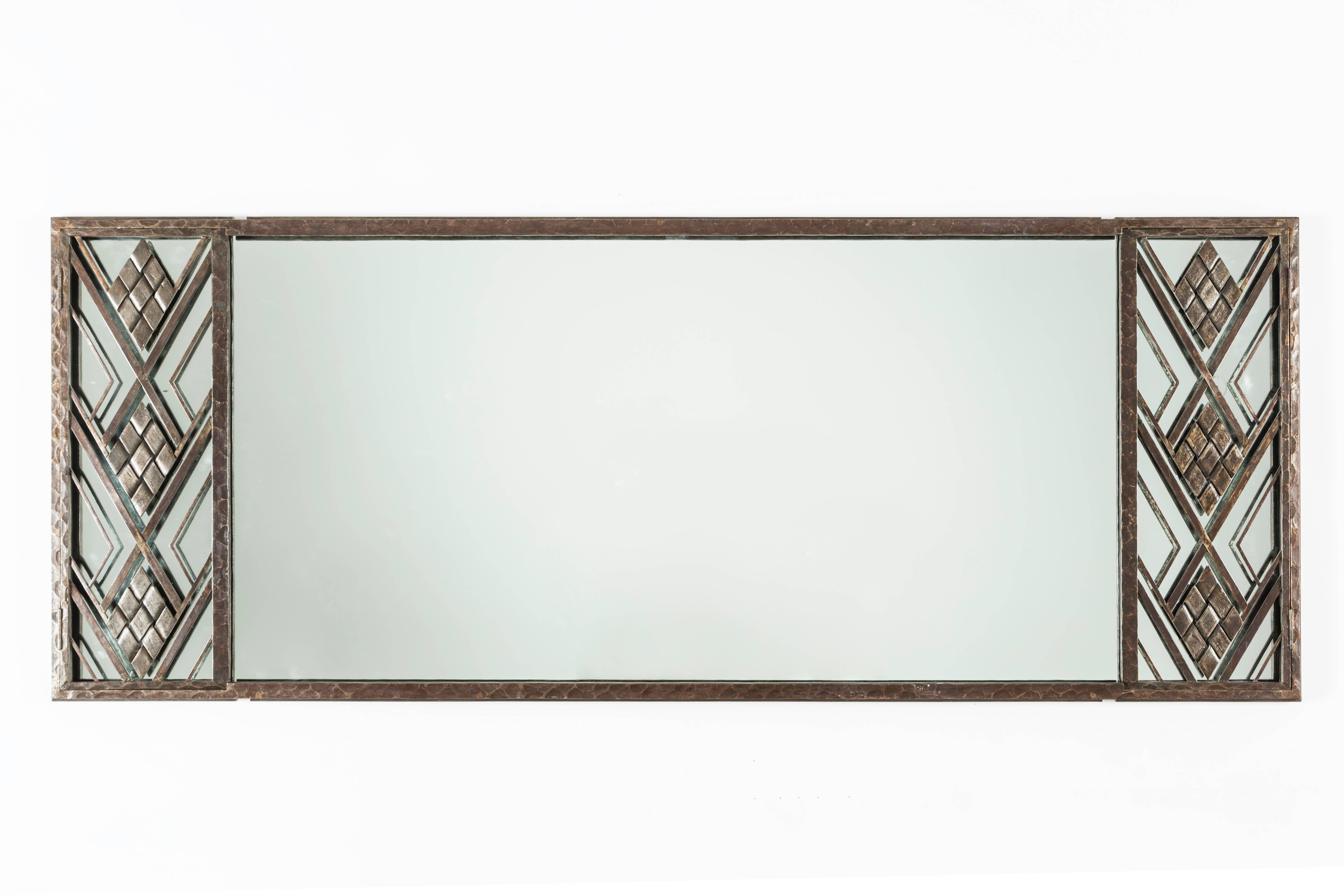 Beautiful, unusual French Art Deco frame.
Welded steel and beautiful embossing throughout this frame.
An ingenious way, is found as lateral doors open for easy access for cleaning.