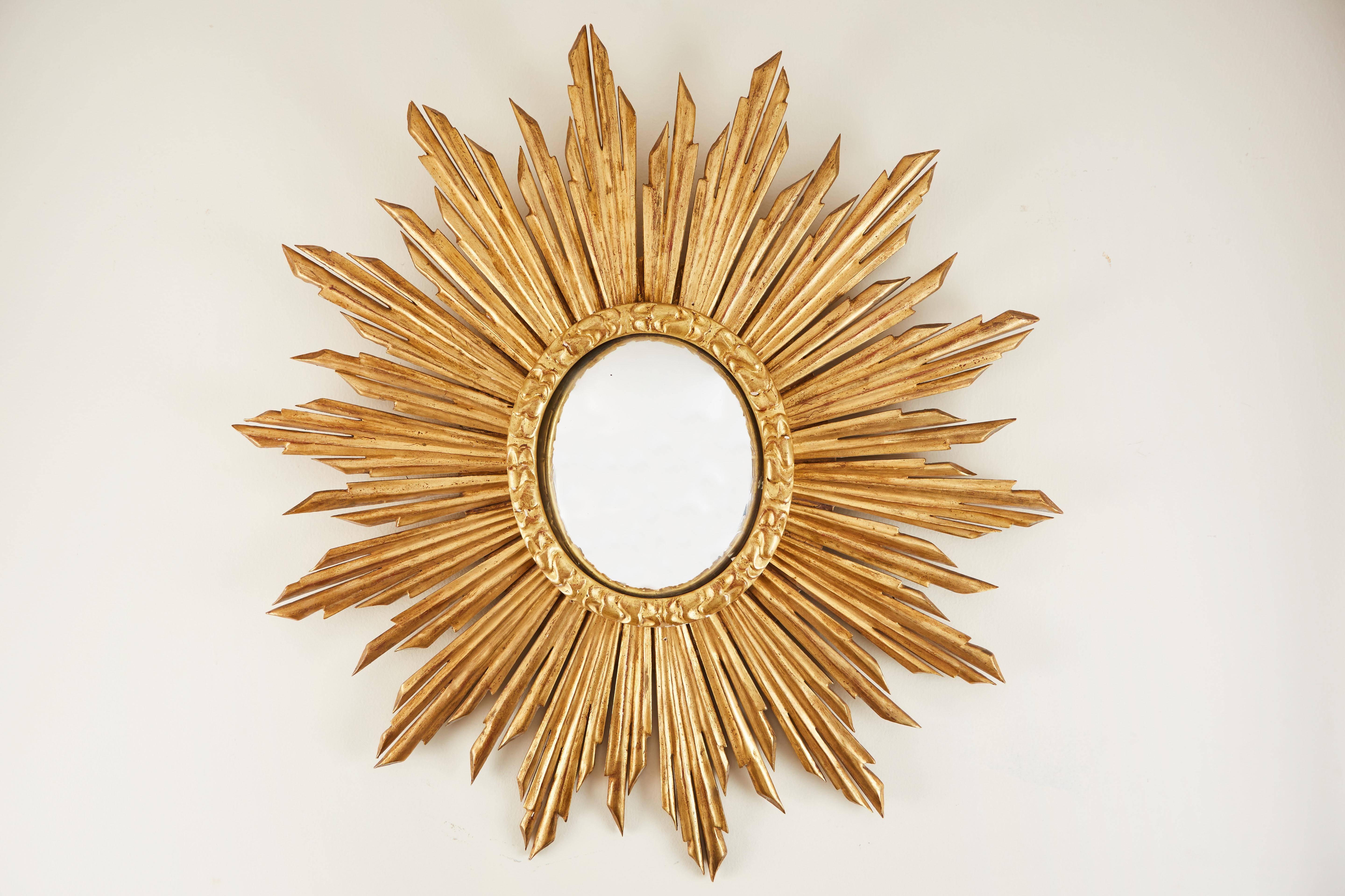 Very nice pair of gilded Italian sun mirrors,
late 20th century, with convex mirrors.
Sold as a pair.