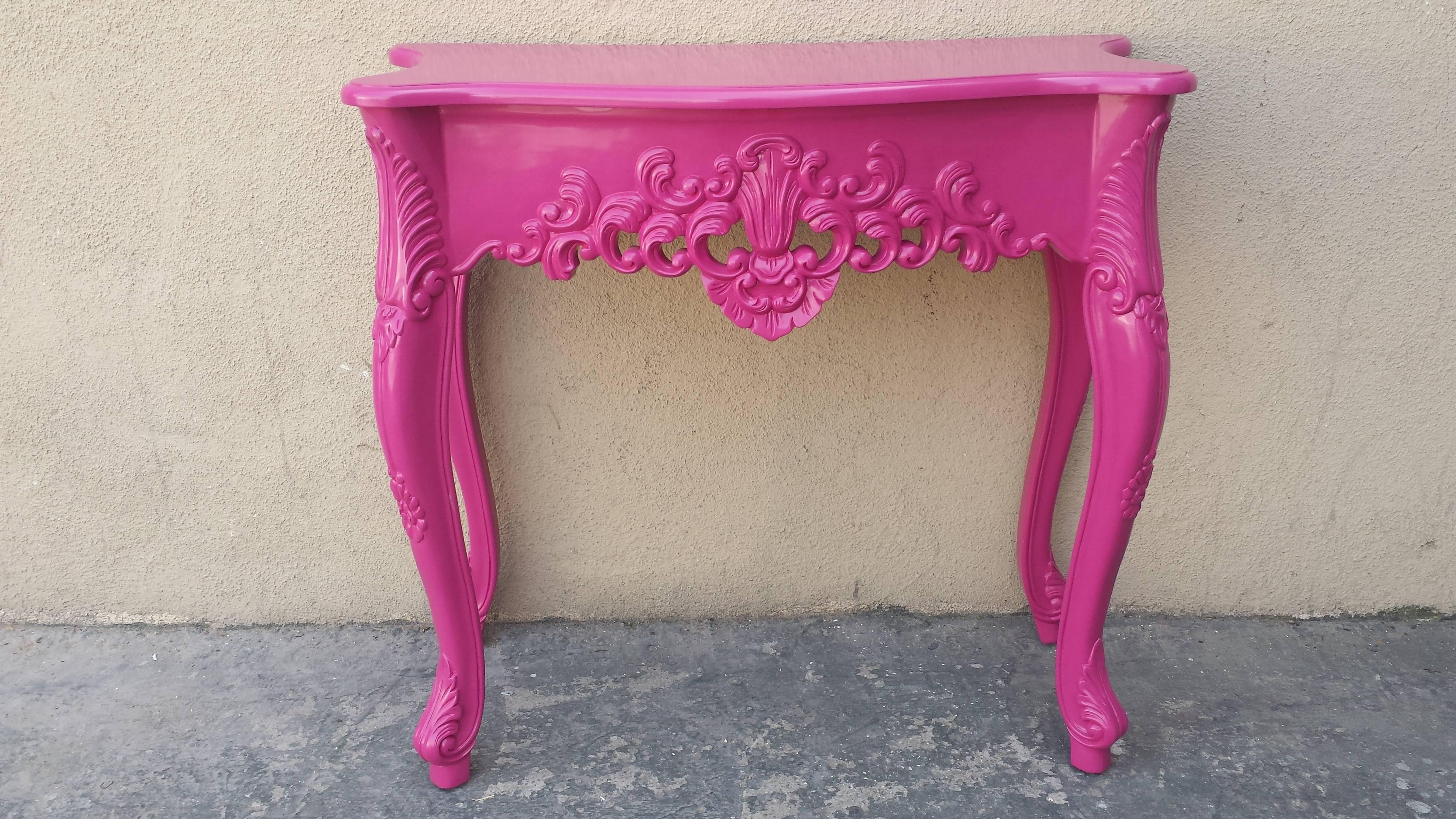 Console table in the French Louis XV Baroque Rococo style. Made from solid mahogany wood. Newly painted in hot pink finish. 
Measures: W 33