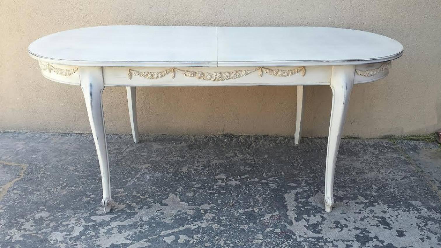 French Country painted white dining table with extension leaf. French antique shabby chic finish.
Dimensions: With leaf W 90