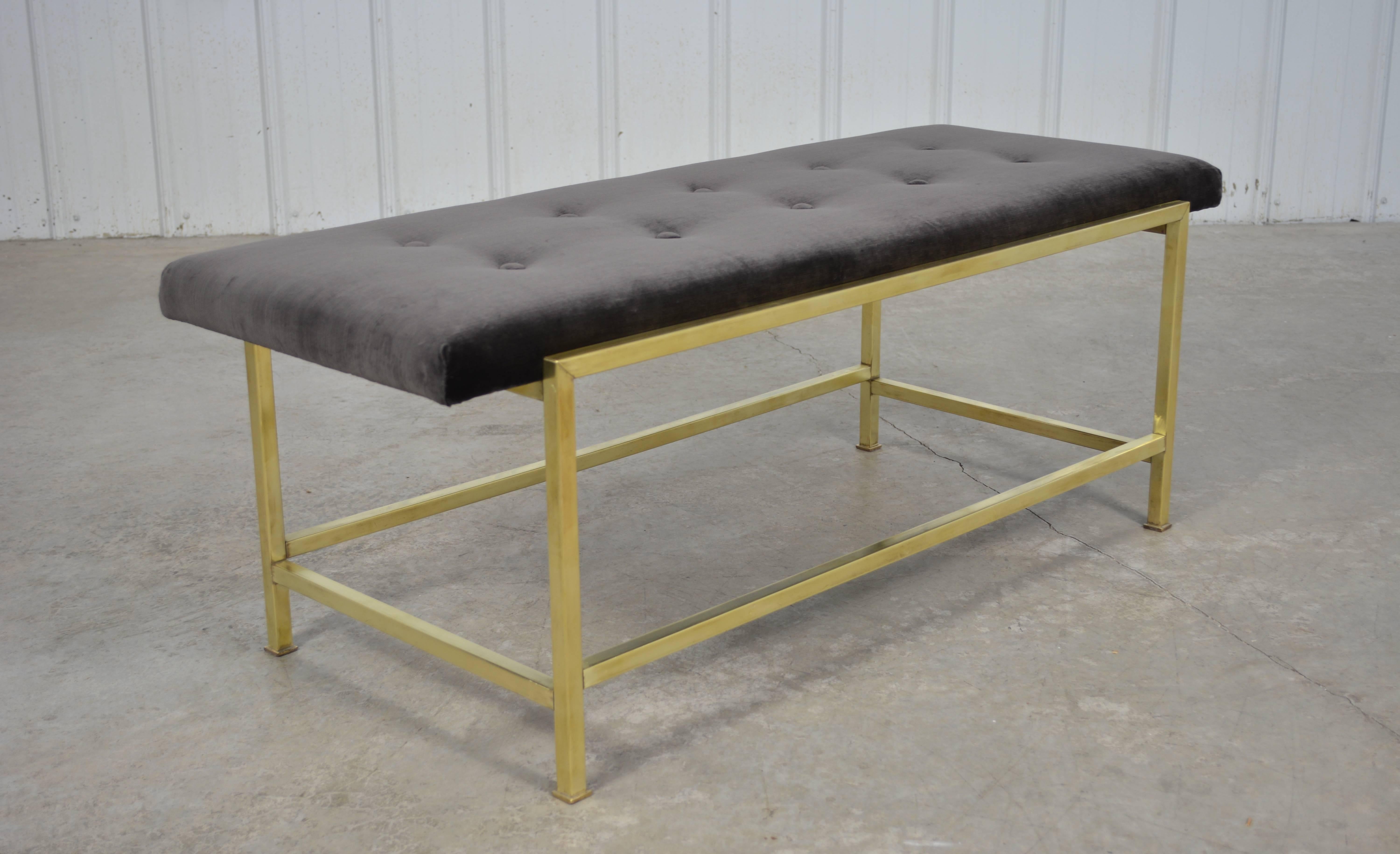 Bench by Edward Wormley for Dunbar. Brass base. Tufted seat newly upholstered in charcoal grey silk velvet. A second matching bench available.