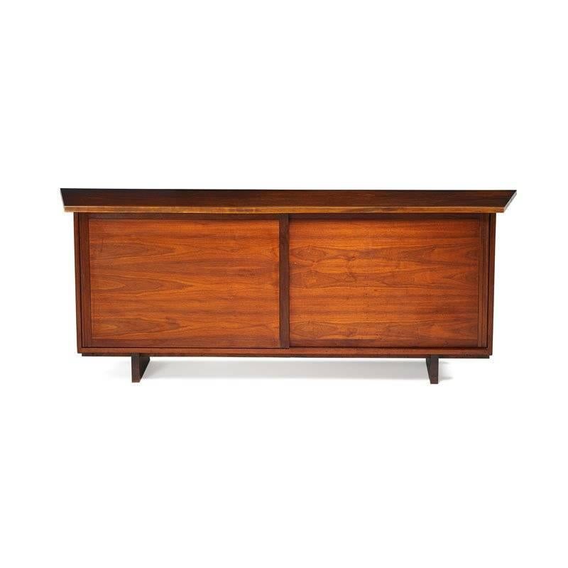 George Nakashima credenza. Walnut construction. Free edge top. This piece can easily function as a dresser, as well. A copy of the original order included.