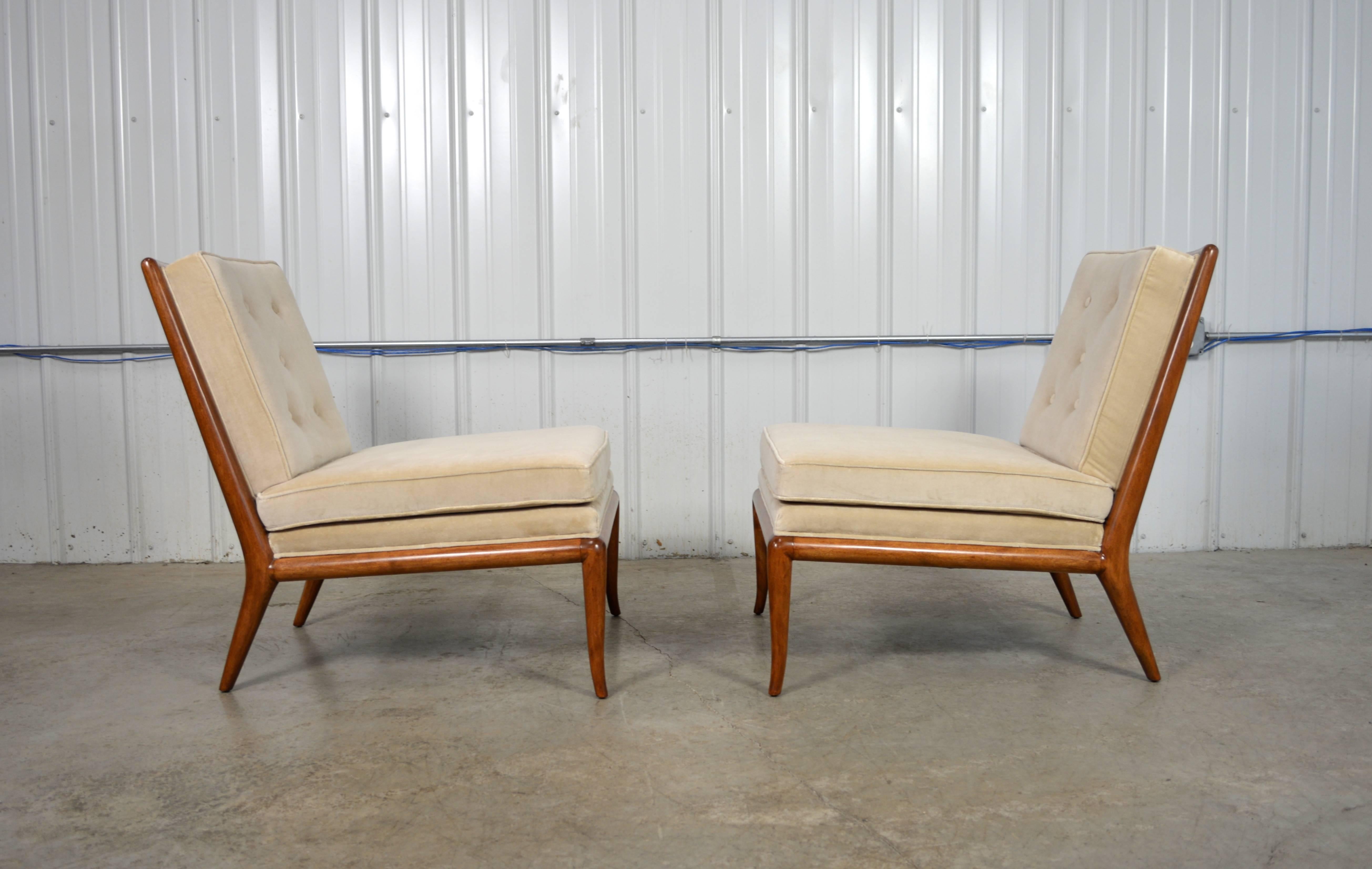 A pair of slipper chairs designed by T.H. Robsjohn-Gibbings for Widdicomb. Newly restored.