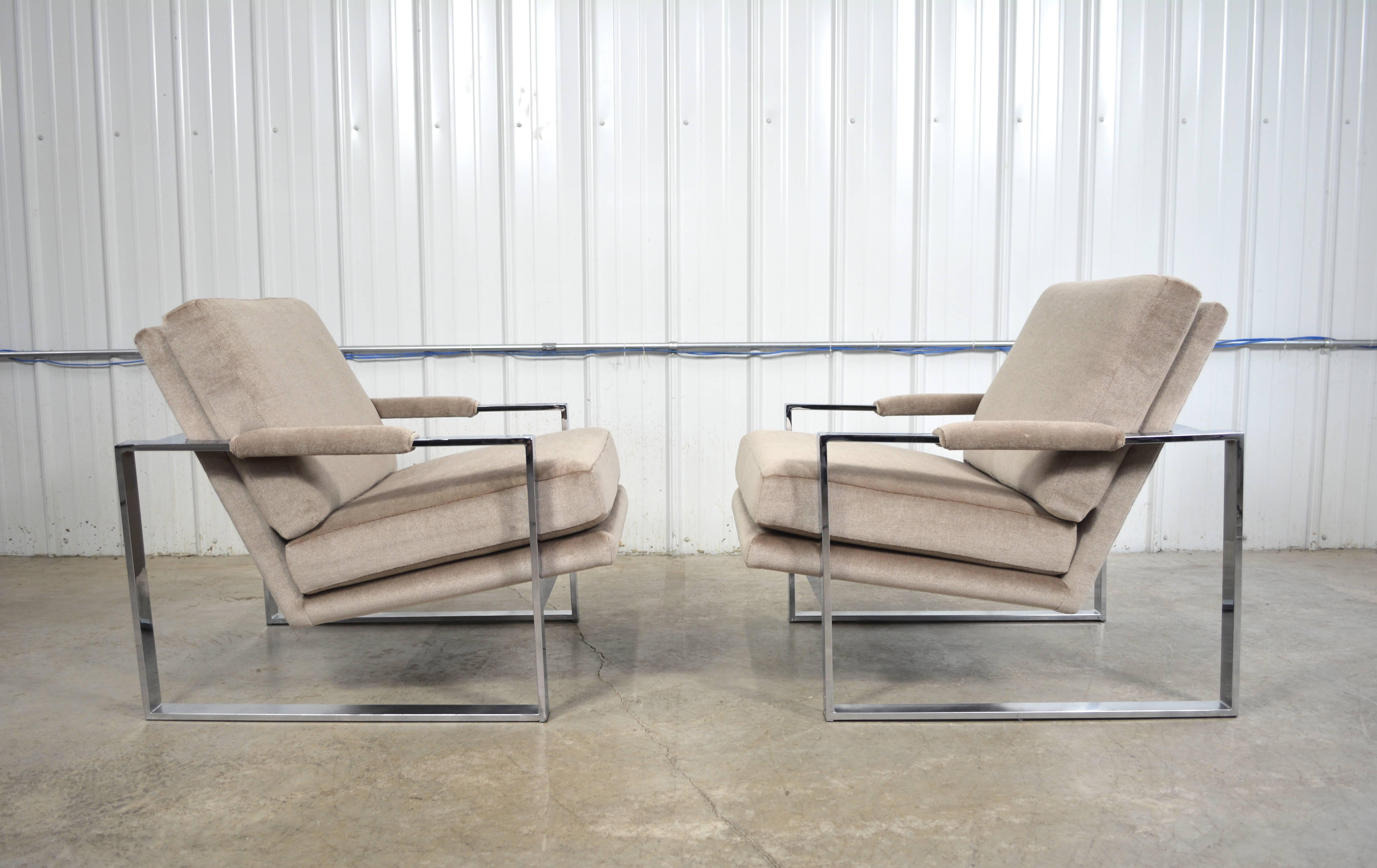 A pair of lounge chairs designed by Milo Baughman. Chromed flat bar frames. Newly reupholstered in mohair.