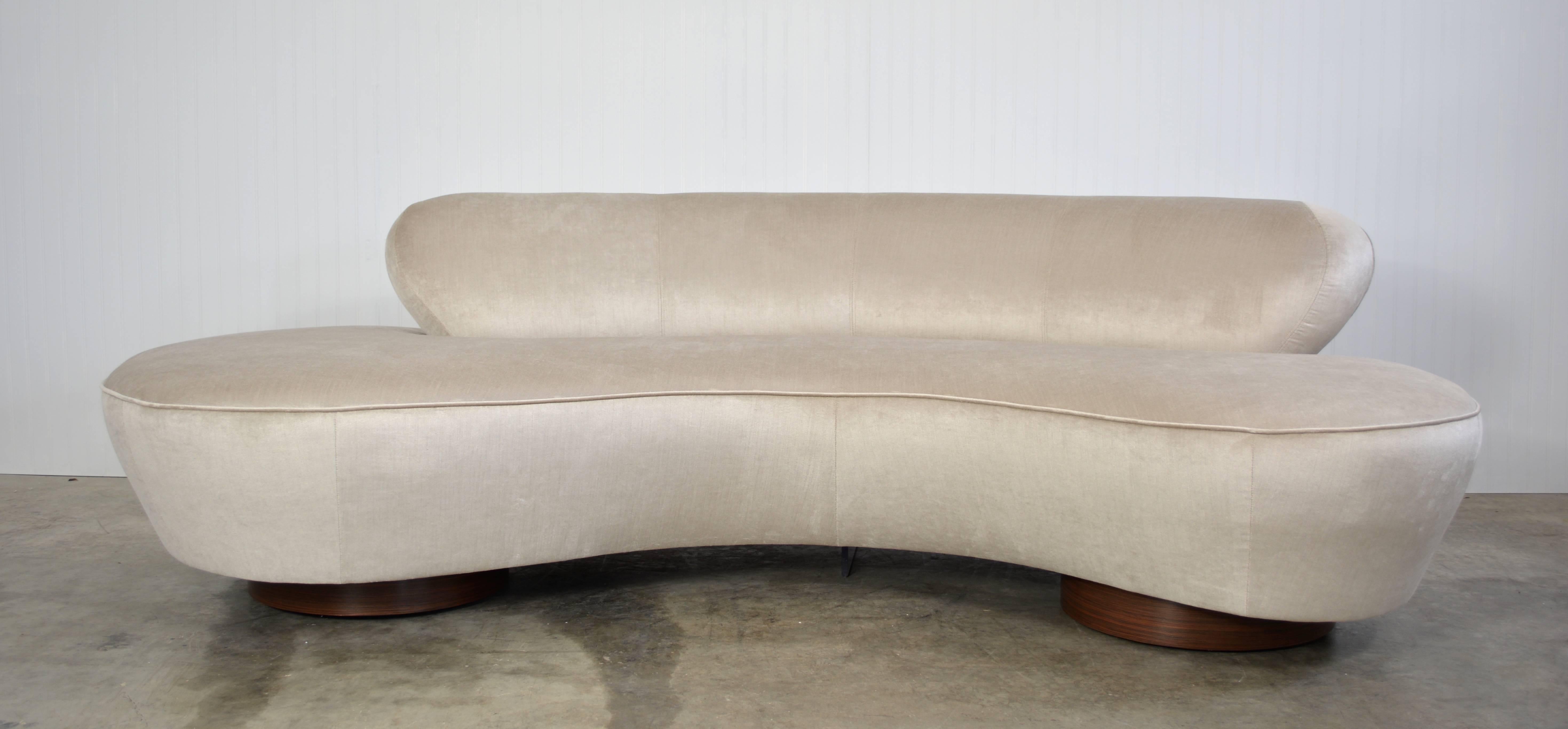 A pair of mirror image Serpentine sofas designed by Vladimir Kagan for Directional. Both are newly recovered in a linen blend velvet over rosewood bases. Both retain their original Directional labels. 

Fabric swatches available upon request.