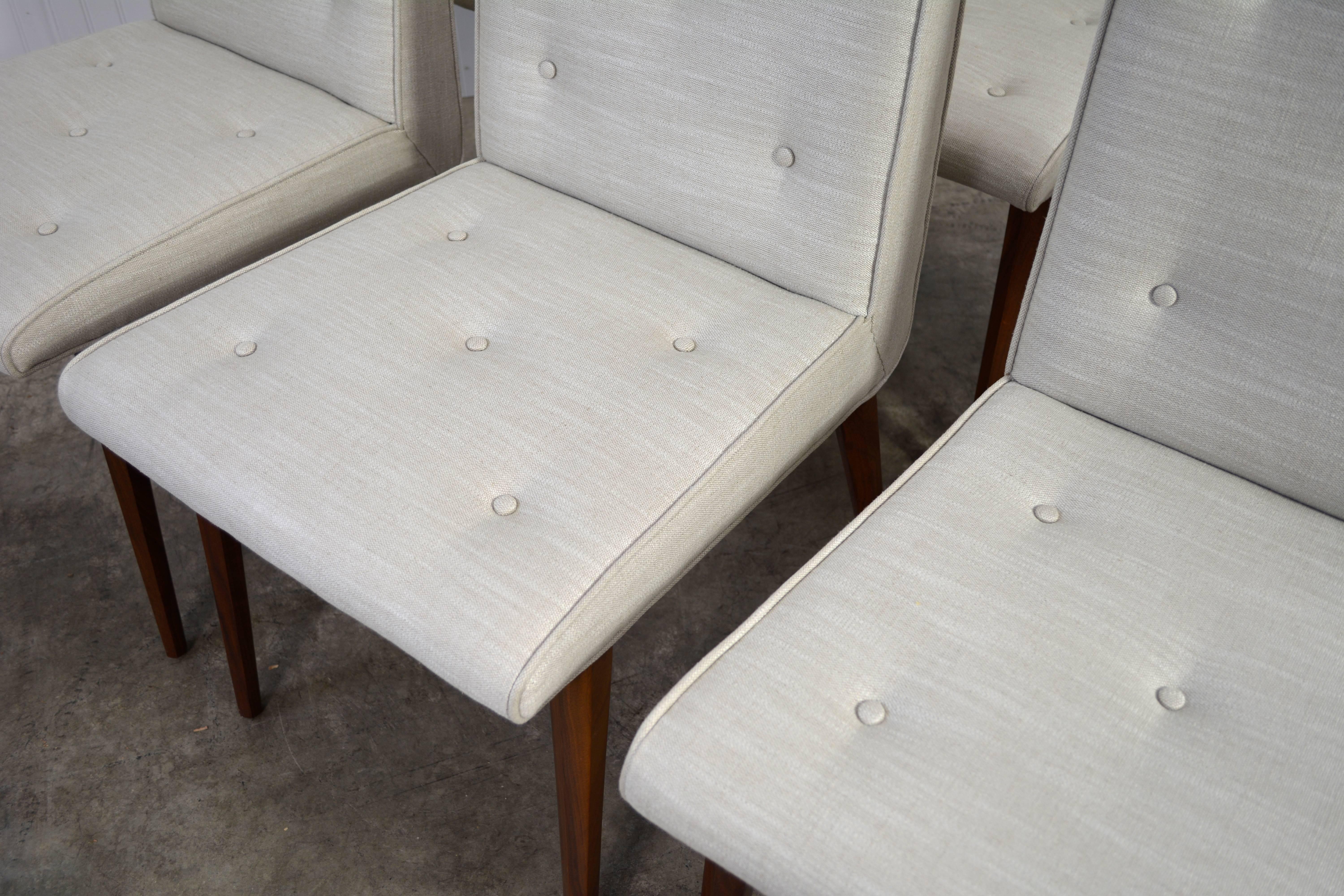 Set of six dining chairs designed by George Nakashima for Widdicomb. 

Newly refinished and recovered in Belgian linen. All pieces labeled. Measure seat height 18.5