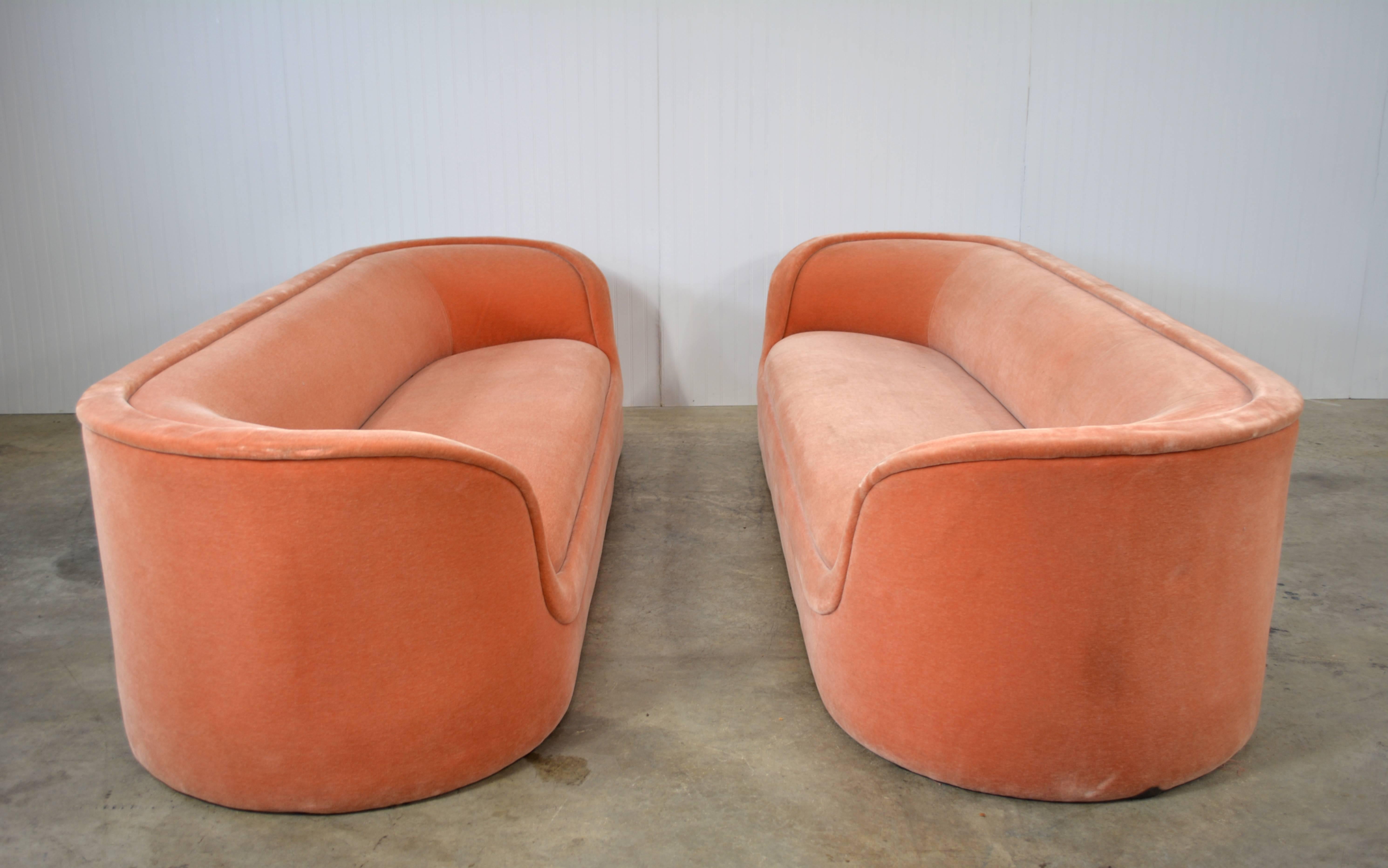 Pair of Ward Bennett Cartouche sofas. Original salmon mohair. Elegant and very desirable design.