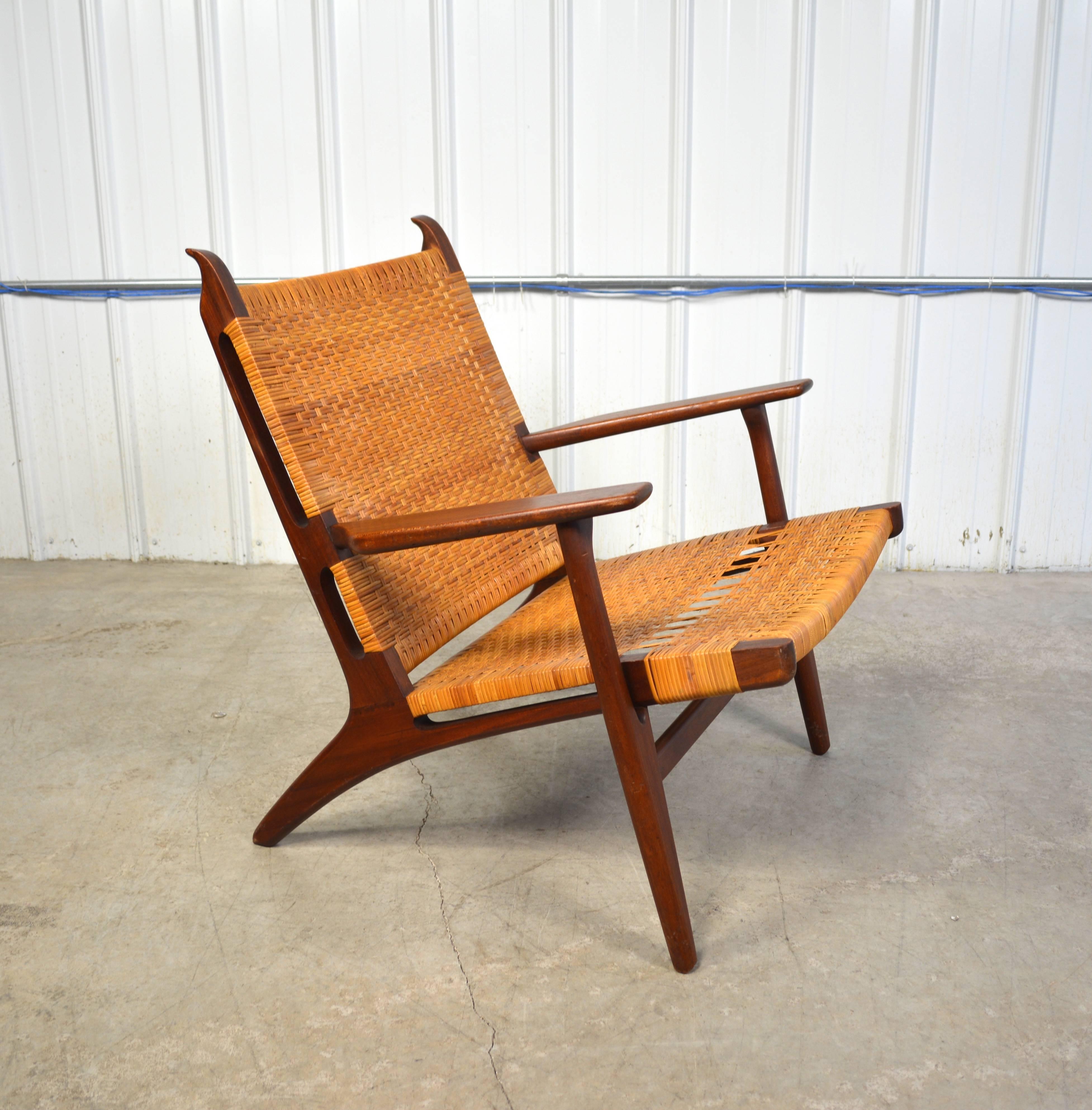 Model # CH27 chair designed by Hans Wegner for Carl Hansen & Son. Teak frame with woven cane seat and back.