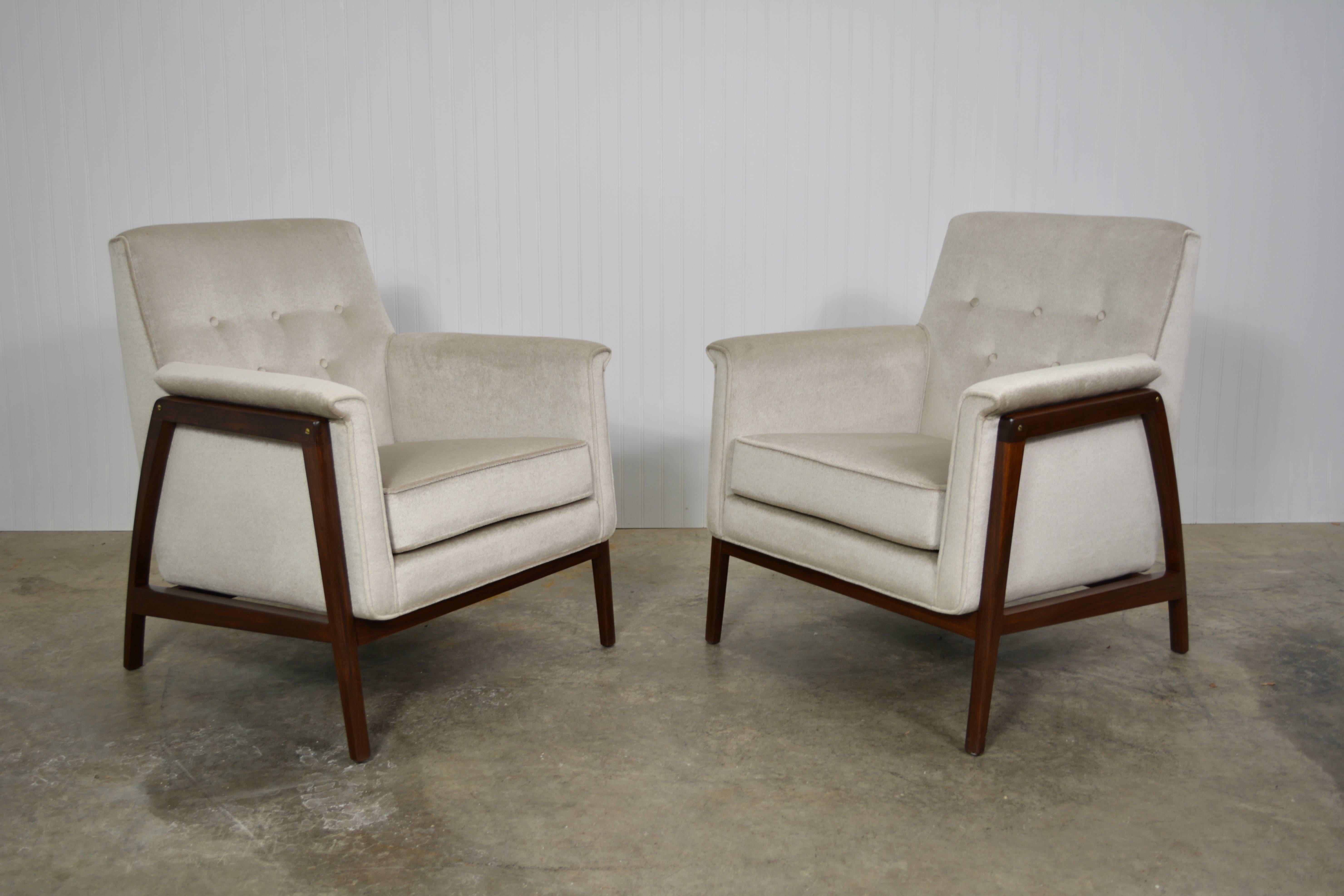A pair of early lounge chairs by Edward Wormley for Dunbar. Newly refinished and recovered in mohair.
