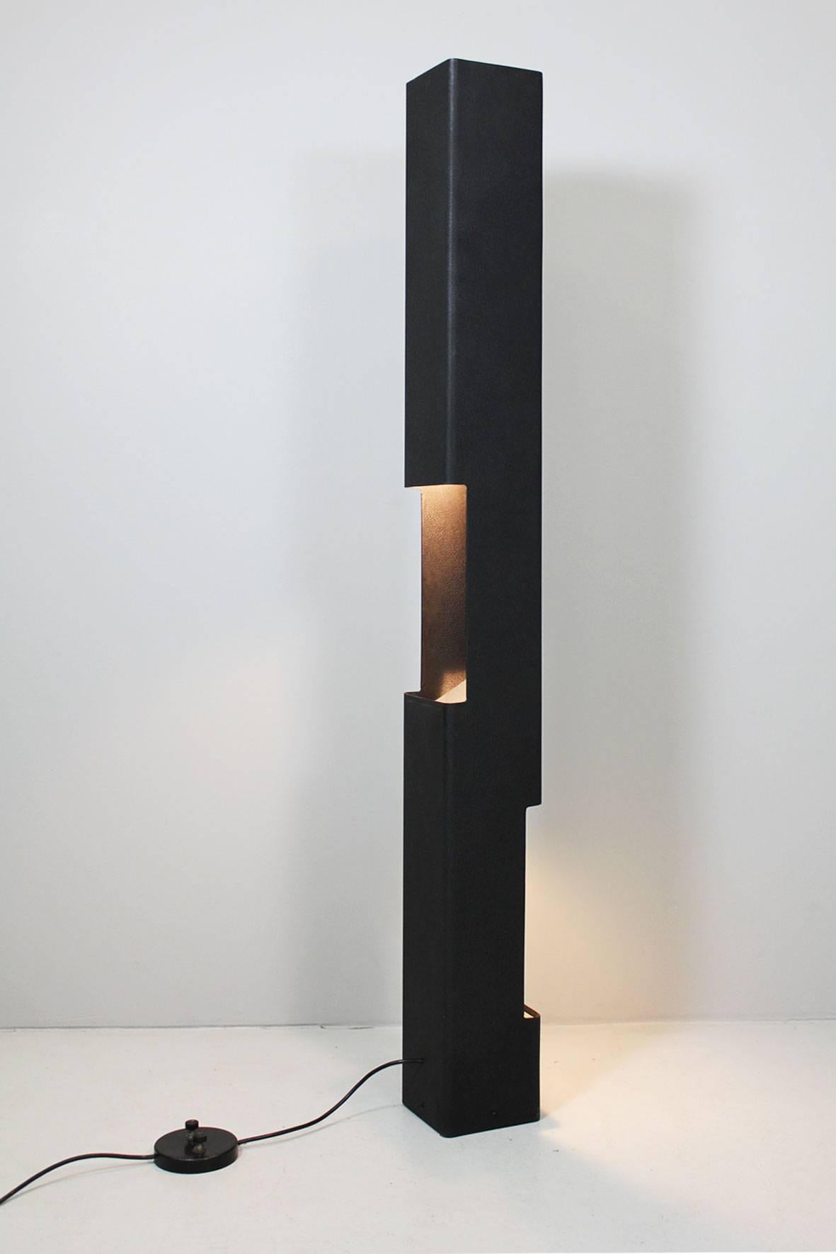 Floor Lamp by Vittoriano Viganò, Arteluce Italy 1960

metal canted & painted black, black textured lacquer,
2 bulbs (top & side)
