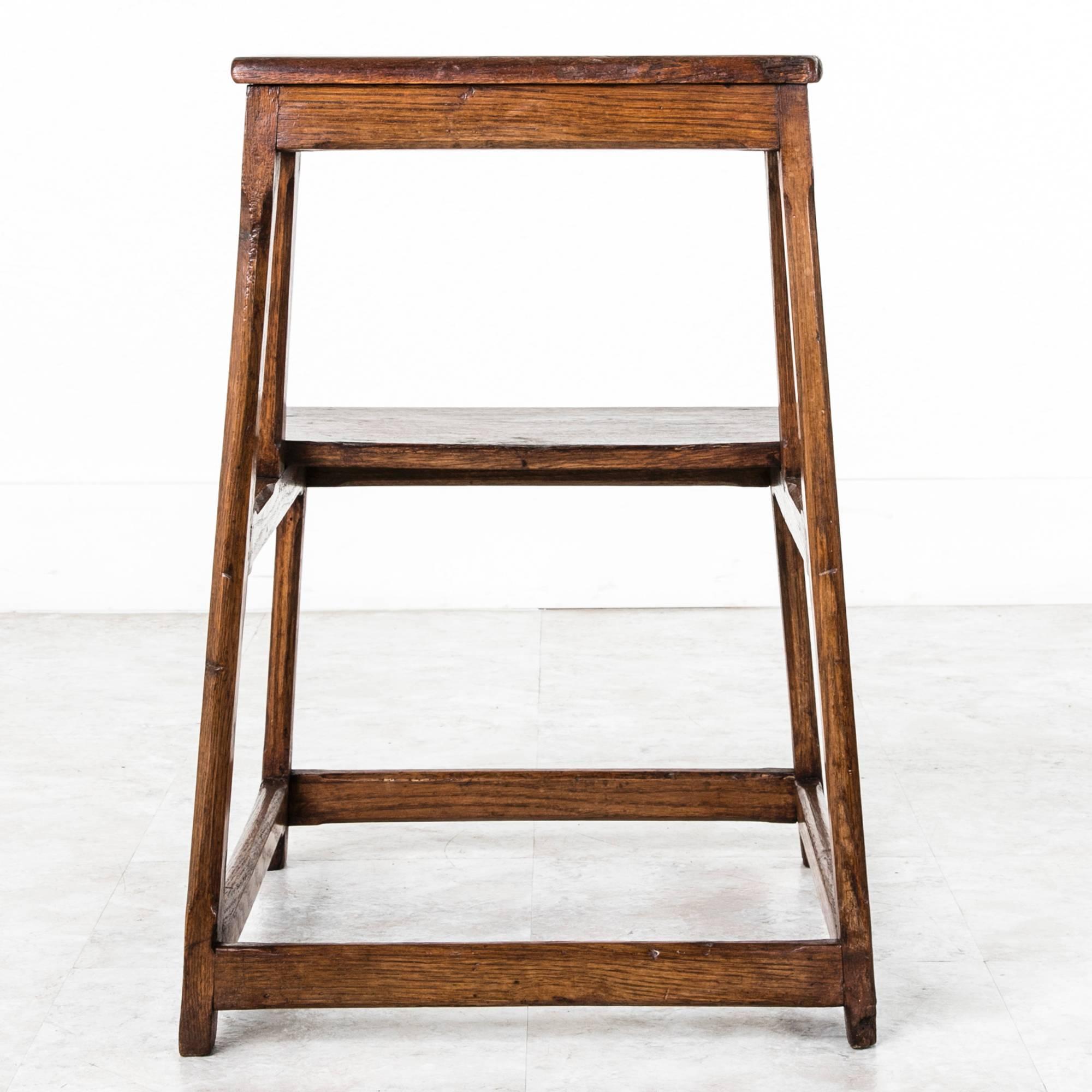 This artisan made hand pegged oak library step ladder is beautifully constructed to stand the test of time. The simple lines and handsomely aged wood make this unique step ladder a versatile piece which could easily serve as a nightstand or side