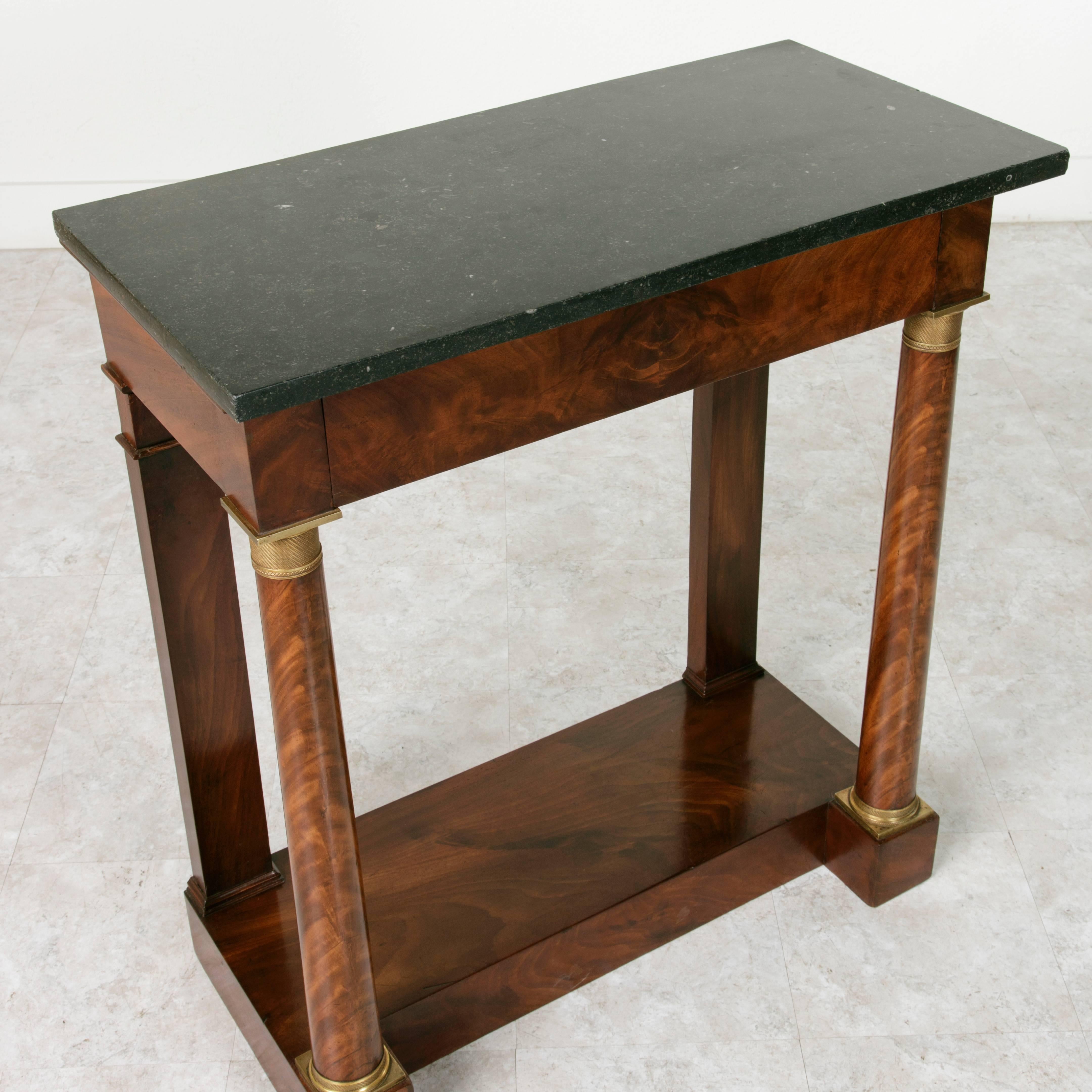 Early 19th Century Period Empire Flamed Mahogany Console Table with Columns and Black Marble